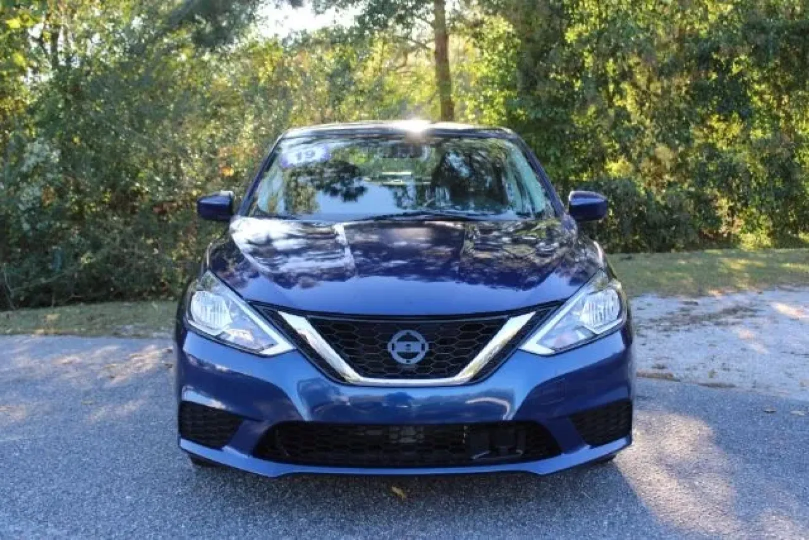 2019 Nissan Sentra S CVT (3N1AB7AP0KY) with an 1.8L L4 SFI DOHC 16 engine, Continuously Variabl transmission, located at 9146 Ocean Hwy West, Calabash, NC, 28467, (910) 579-1110, 33.928635, -78.576157 - **Discover the Perfect Blend of Comfort and Affordability with the 2019 Nissan Sentra at Car City - Whitesville!**<br /> <br /> If you're seeking a reliable, stylish, and efficient sedan for your daily commute or weekend getaways, look no further than this 2019 Nissan Sentra, available now at Car Ci - Photo#1
