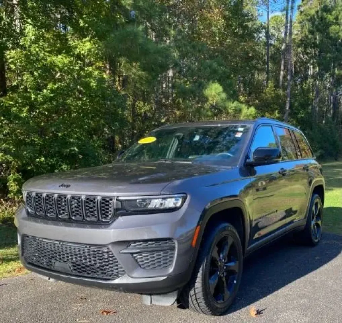 2023 /Global Black Jeep Grand Cherokee Altitude 4x4 (1C4RJHAGXPC) with an Pentastar 3.6L V-6 DOHC engine, located at 9146 Ocean Hwy West, Calabash, NC, 28467, (910) 579-1110, 33.928635, -78.576157 - **Explore the Open Road with the 2023 Jeep Grand Cherokee Altitude 4x4 Your Adventure Awaits!**<br /> <br /> Imagine navigating the beautiful winding roads of Calabash, NC, with family and friends in the standout 2023 Jeep Grand Cherokee Altitude 4x4. Perfect for weekend adventures or daily commute - Photo#0
