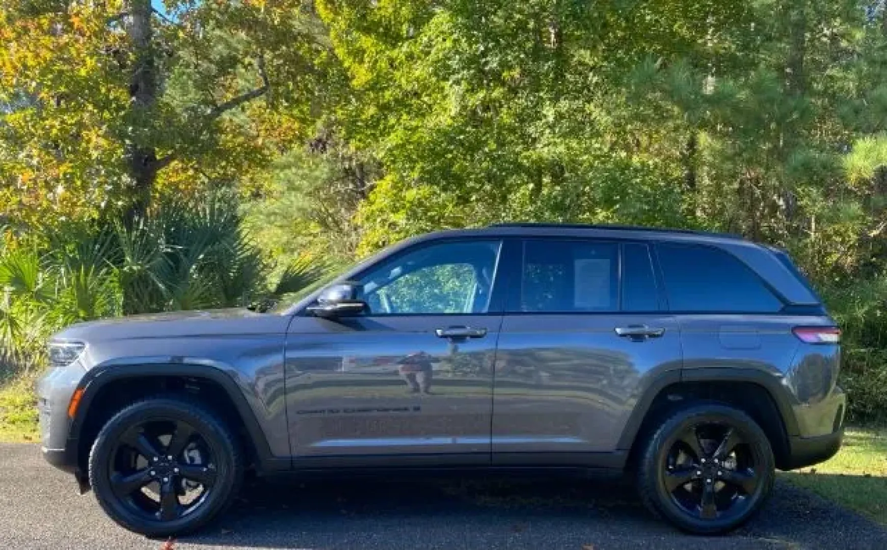 2023 /Global Black Jeep Grand Cherokee Altitude 4x4 (1C4RJHAGXPC) with an Pentastar 3.6L V-6 DOHC engine, located at 9146 Ocean Hwy West, Calabash, NC, 28467, (910) 579-1110, 33.928635, -78.576157 - **Explore the Open Road with the 2023 Jeep Grand Cherokee Altitude 4x4 Your Adventure Awaits!**<br /> <br /> Imagine navigating the beautiful winding roads of Calabash, NC, with family and friends in the standout 2023 Jeep Grand Cherokee Altitude 4x4. Perfect for weekend adventures or daily commute - Photo#1