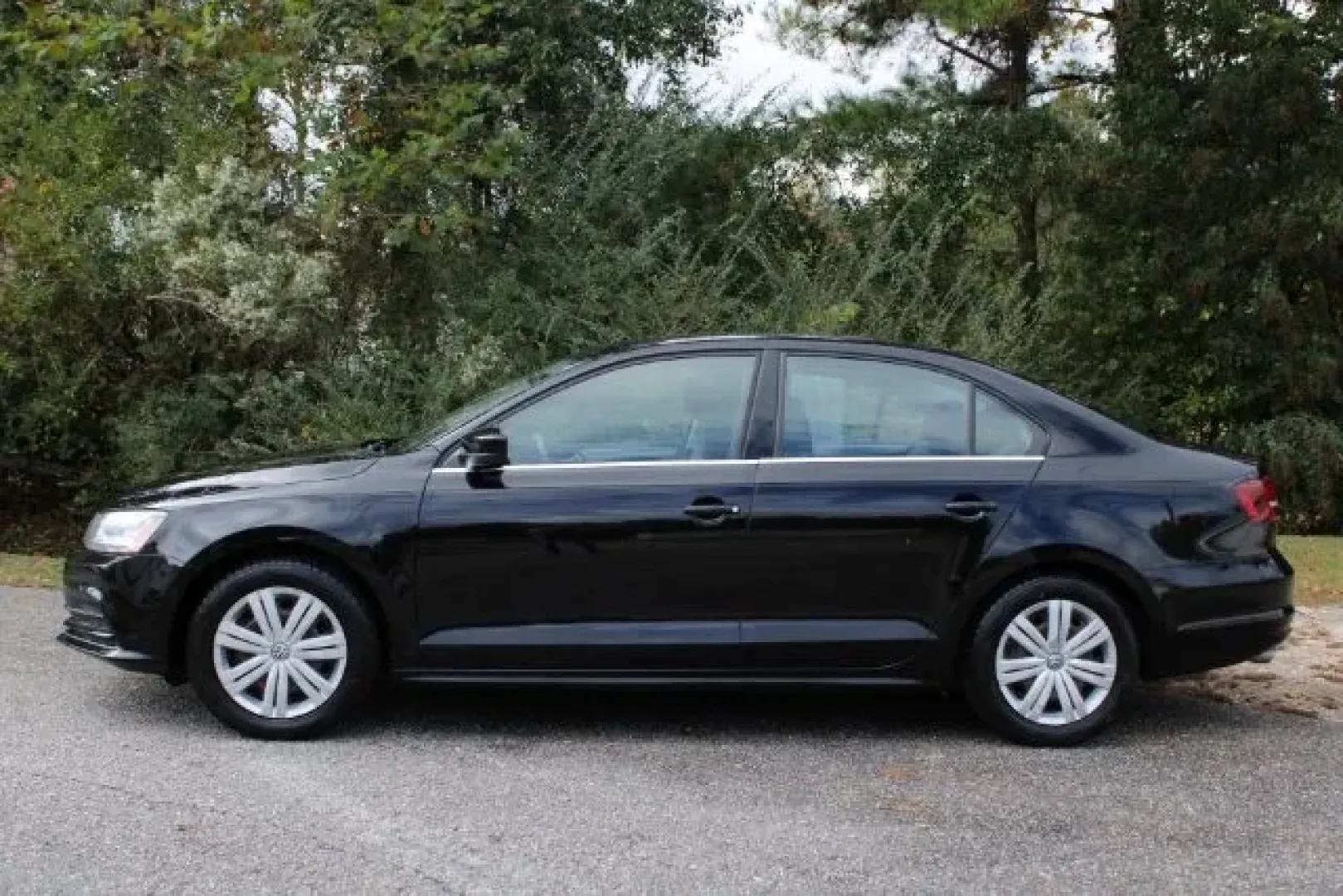 2017 Volkswagen Jetta 1.4T S 6A (3VW2B7AJ5HM) with an 1.4L L4 DOHC 20V engine, 6-Speed Automatic transmission, located at 3598 James B White Hwy South, Whiteville, NC, 28472, (910) 642-3196, 34.294846, -78.732613 - **Unleash the Thrill of the Open Road with the 2017 Volkswagen Jetta - Your Ideal Commuter Companion!**<br /> <br /> Are you searching for a reliable and stylish sedan that fits seamlessly into your busy lifestyle? Look no further than this 2017 Volkswagen Jetta, available now at Car City - Whitesvi - Photo#4