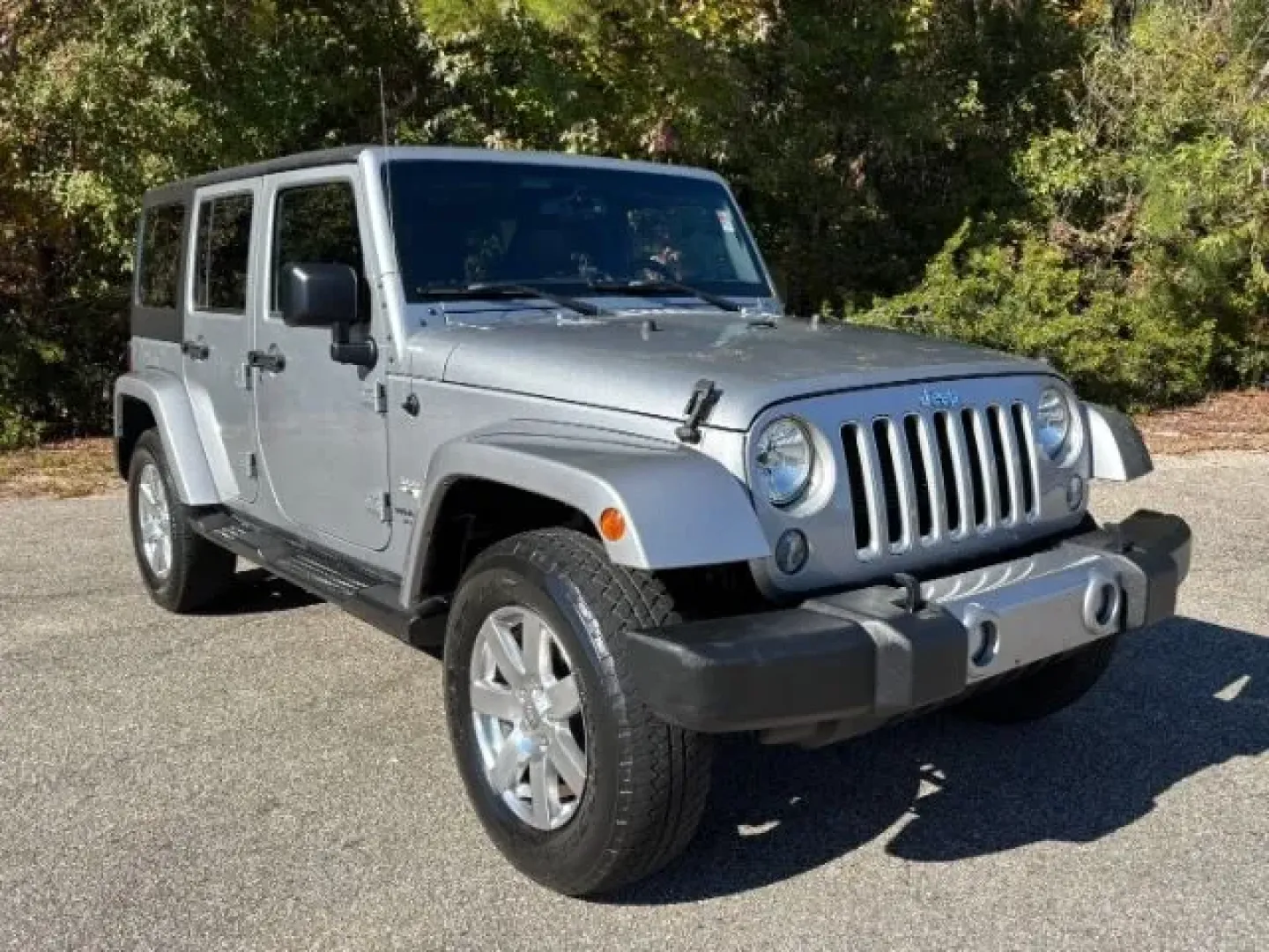 2016 /Black Jeep Wrangler Sahara (1C4BJWEG0GL) with an Pentastar 3.6L V-6 DOHC engine, located at 2761 East Hwy 501, Conway, SC, 29526, (843) 331-1151, 33.781528, -78.989883 - **Adventure Awaits: Explore the Open Road in a 2016 Jeep Wrangler Sahara!**<br /> <br /> Are you ready to elevate your weekend getaways or daily commutes in a rugged yet comfortable SUV? Look no further than this stunning 2016 Jeep Wrangler Sahara, available now at Car City - Conway in Conway, SC. W - Photo#1