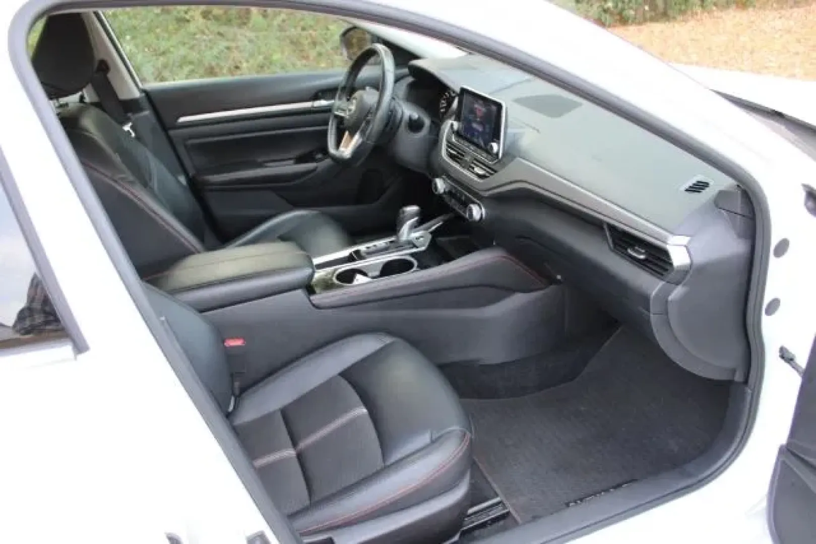 2024 Nissan Altima SR FWD (1N4BL4CV3RN) with an 2.5L I-4 gasoline direct injection engine, located at 3598 James B White Hwy South, Whiteville, NC, 28472, (910) 642-3196, 34.294846, -78.732613 - Are you searching for a reliable and stylish sedan that fits perfectly into your busy lifestyle? Look no further than this stunning 2024 Nissan Altima SR FWD, available now at Car City - Whitesville! This pre-owned vehicle is ideal for families, commuters, and anyone who appreciates quality used veh - Photo#9