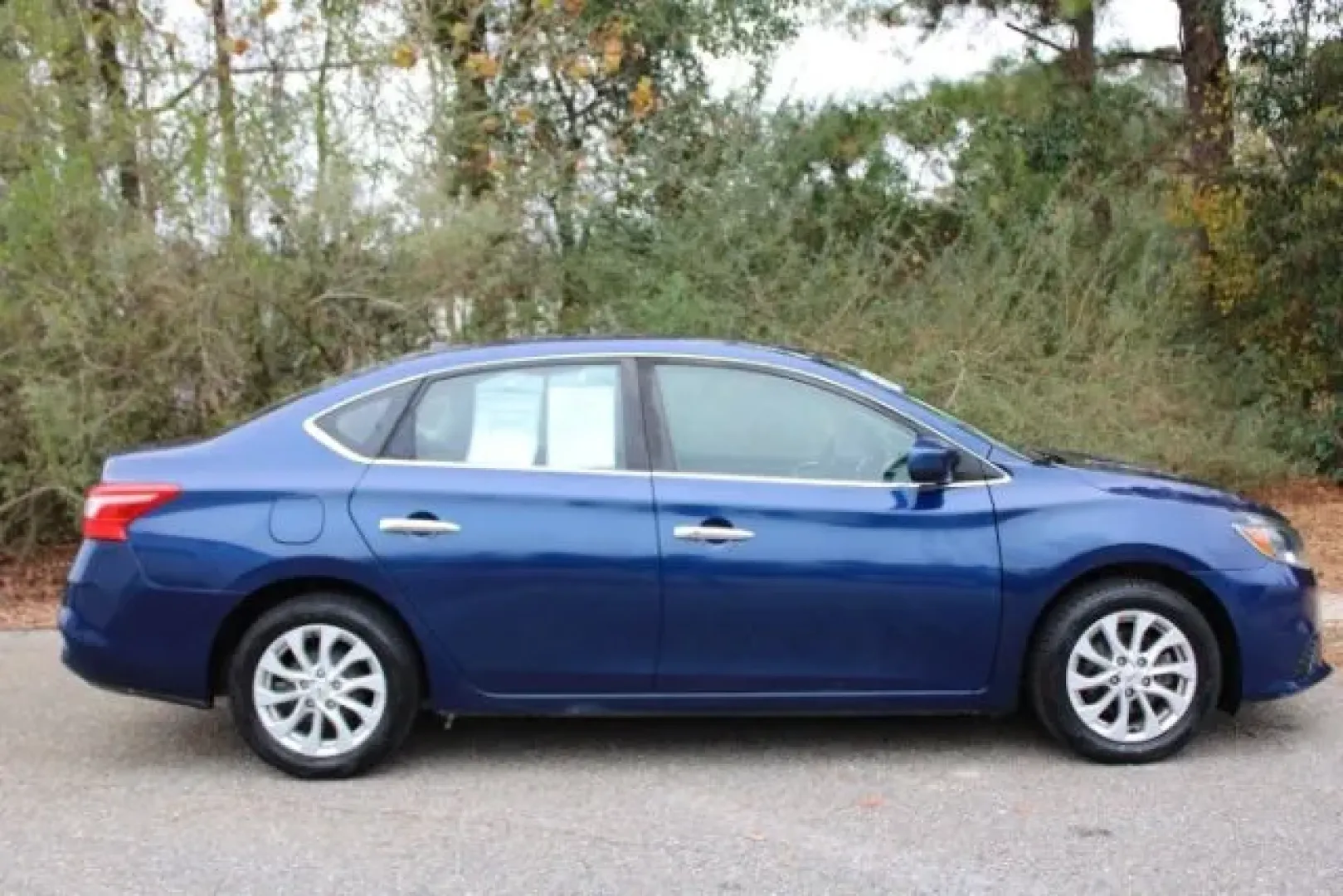 2018 /BLACK Nissan Sentra SV (3N1AB7AP0JL) with an 1.8L L4 SFI DOHC 16 engine, Continuously Variabl transmission, located at 3598 James B White Hwy South, Whiteville, NC, 28472, (910) 642-3196, 34.294846, -78.732613 - Are you on the lookout for a reliable and stylish sedan that's perfect for daily commutes or weekend getaways? Look no further than this striking 2018 Nissan Sentra SV, available now at Car City - Whitesville. Located conveniently at 3598 James B White Hwy South, Whiteville, NC 28472, our pre-owned - Photo#3