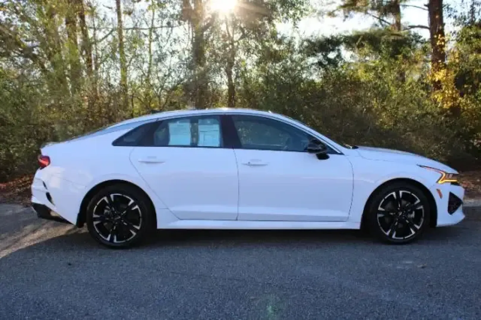2022 Kia K5 GT-Line (5XXG64J23NG) with an Gamma-II 1.6L I-4 gasoline direct injection engine, 8A transmission, located at 9146 Ocean Hwy West, Calabash, NC, 28467, (910) 579-1110, 33.928635, -78.576157 - Are you in the market for a vehicle that perfectly balances style, comfort, and efficiency? Look no further than this stunning 2022 Kia K5 GT-Line available at Car City - Whitesville, located at 3598 James B White Hwy South, Whiteville, NC 28472. This pre-owned sedan is designed for modern lifestyle - Photo#3
