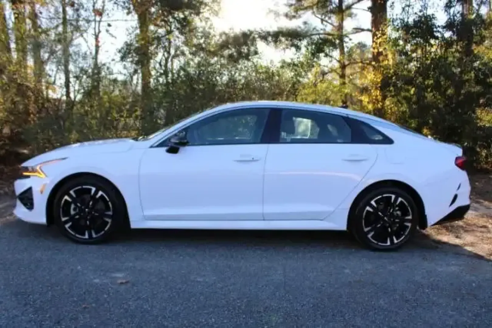 2022 Kia K5 GT-Line (5XXG64J23NG) with an Gamma-II 1.6L I-4 gasoline direct injection engine, 8A transmission, located at 9146 Ocean Hwy West, Calabash, NC, 28467, (910) 579-1110, 33.928635, -78.576157 - Are you in the market for a vehicle that perfectly balances style, comfort, and efficiency? Look no further than this stunning 2022 Kia K5 GT-Line available at Car City - Whitesville, located at 3598 James B White Hwy South, Whiteville, NC 28472. This pre-owned sedan is designed for modern lifestyle - Photo#4