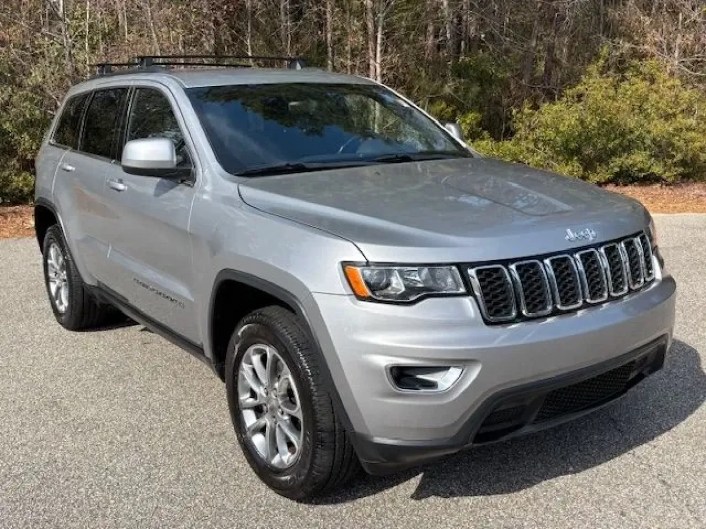 2017 /Black, cloth Jeep Grand Cherokee Laredo 4WD (1C4RJFAG7HC) with an 3.6L V6 DOHC 24V engine, 8-Speed Automatic transmission, located at 2761 East Hwy 501, Conway, SC, 29526, (843) 331-1151, 33.781528, -78.989883 - Need an SUV that can handle school drop-offs in the morning, a long commute down Hwy 501, and a last-minute beach run to Myrtle Beach on the weekend? This 2017 Jeep Grand Cherokee Laredo 4WD is built for real-life Carolina schedules-comfortable, confident in changing weather, and ready for road trip - Photo#1