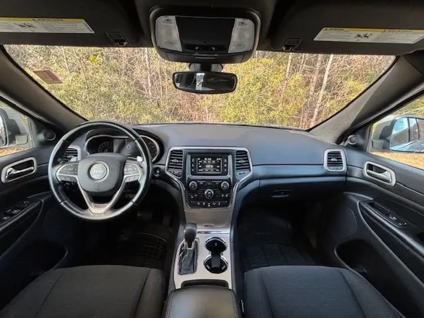 2017 /Black, cloth Jeep Grand Cherokee Laredo 4WD (1C4RJFAG7HC) with an 3.6L V6 DOHC 24V engine, 8-Speed Automatic transmission, located at 2761 East Hwy 501, Conway, SC, 29526, (843) 331-1151, 33.781528, -78.989883 - Need an SUV that can handle school drop-offs in the morning, a long commute down Hwy 501, and a last-minute beach run to Myrtle Beach on the weekend? This 2017 Jeep Grand Cherokee Laredo 4WD is built for real-life Carolina schedules-comfortable, confident in changing weather, and ready for road trip - Photo#8