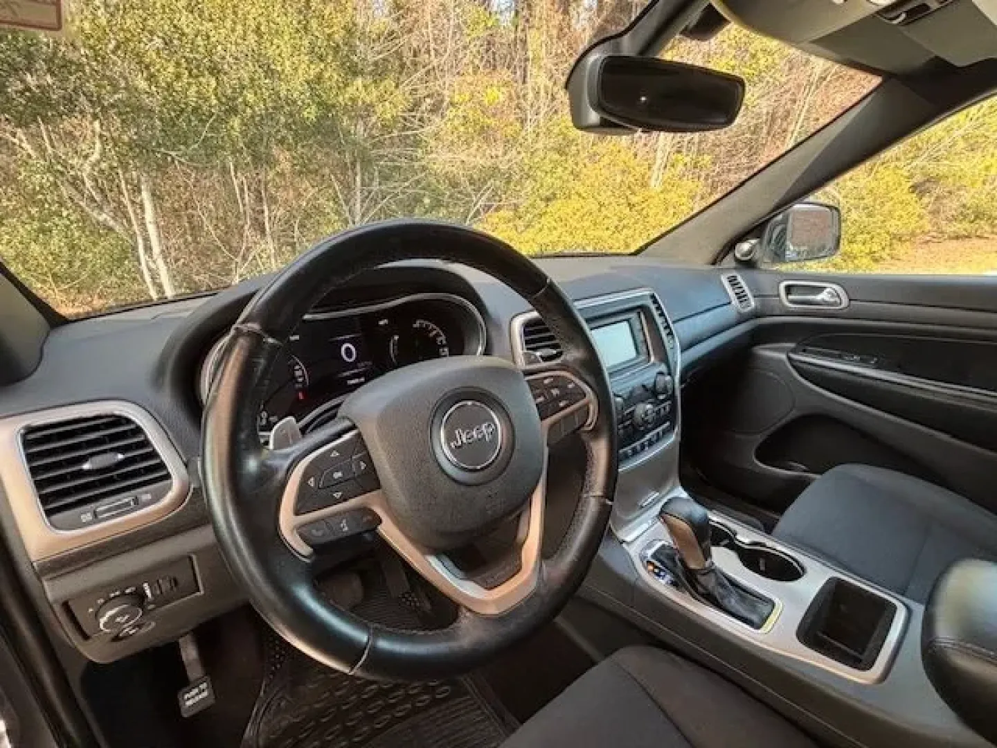 2017 /Black, cloth Jeep Grand Cherokee Laredo 4WD (1C4RJFAG7HC) with an 3.6L V6 DOHC 24V engine, 8-Speed Automatic transmission, located at 2761 East Hwy 501, Conway, SC, 29526, (843) 331-1151, 33.781528, -78.989883 - Need an SUV that can handle school drop-offs in the morning, a long commute down Hwy 501, and a last-minute beach run to Myrtle Beach on the weekend? This 2017 Jeep Grand Cherokee Laredo 4WD is built for real-life Carolina schedules-comfortable, confident in changing weather, and ready for road trip - Photo#9