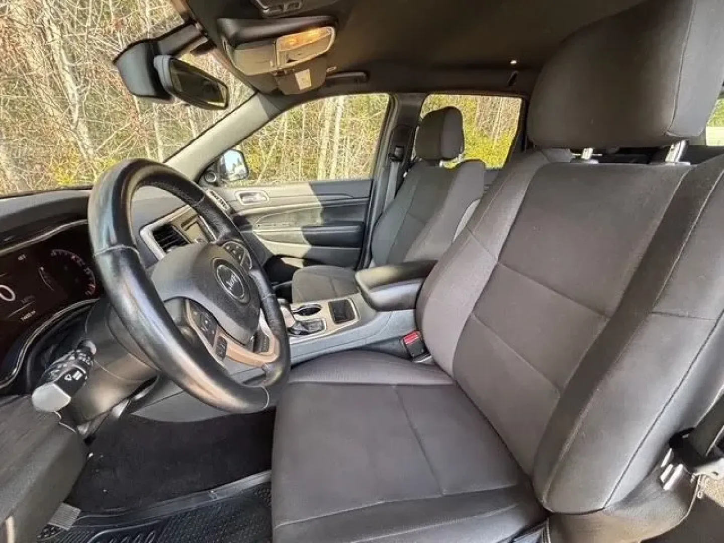 2017 /Black, cloth Jeep Grand Cherokee Laredo 4WD (1C4RJFAG7HC) with an 3.6L V6 DOHC 24V engine, 8-Speed Automatic transmission, located at 2761 East Hwy 501, Conway, SC, 29526, (843) 331-1151, 33.781528, -78.989883 - Need an SUV that can handle school drop-offs in the morning, a long commute down Hwy 501, and a last-minute beach run to Myrtle Beach on the weekend? This 2017 Jeep Grand Cherokee Laredo 4WD is built for real-life Carolina schedules-comfortable, confident in changing weather, and ready for road trip - Photo#10