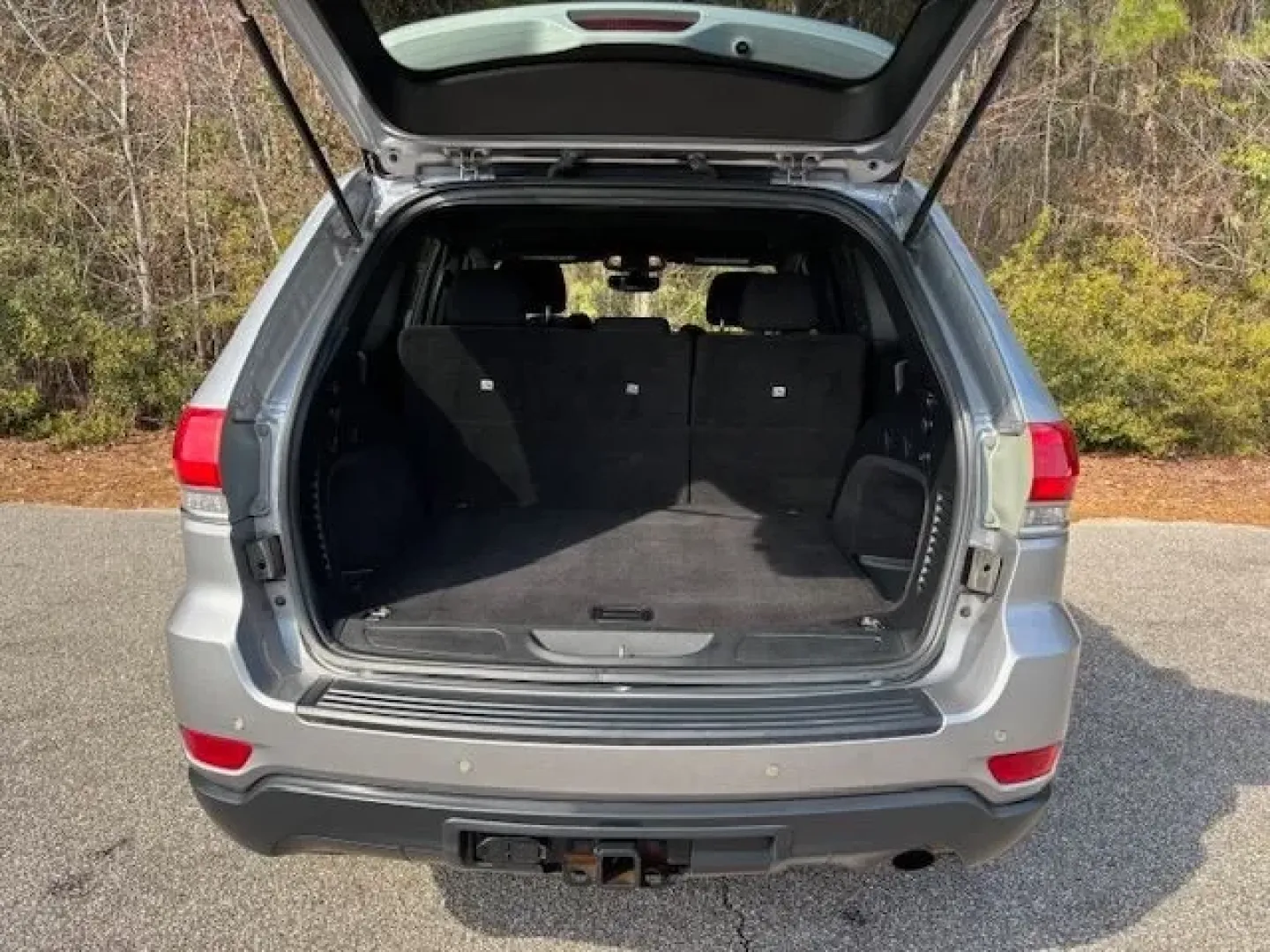 2017 /Black, cloth Jeep Grand Cherokee Laredo 4WD (1C4RJFAG7HC) with an 3.6L V6 DOHC 24V engine, 8-Speed Automatic transmission, located at 2761 East Hwy 501, Conway, SC, 29526, (843) 331-1151, 33.781528, -78.989883 - Need an SUV that can handle school drop-offs in the morning, a long commute down Hwy 501, and a last-minute beach run to Myrtle Beach on the weekend? This 2017 Jeep Grand Cherokee Laredo 4WD is built for real-life Carolina schedules-comfortable, confident in changing weather, and ready for road trip - Photo#13