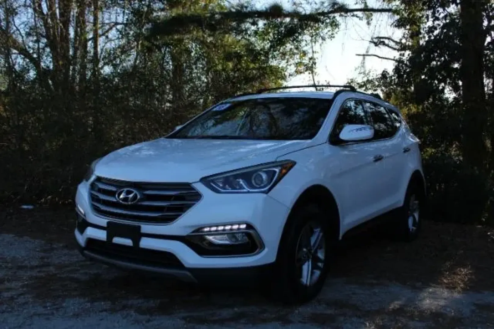 2018 Hyundai Santa Fe Sport 2.4 AWD (5NMZUDLB4JH) with an 2.4L L4 DOHC 16V engine, 6-Speed Automatic transmission, located at 3598 James B White Hwy South, Whiteville, NC, 28472, (910) 642-3196, 34.294846, -78.732613 - **Explore the Open Road with the 2018 Hyundai Santa Fe Sport Your Next Adventure Awaits!**<br /> <br /> Are you ready to elevate your weekend getaways or family outings? The 2018 Hyundai Santa Fe Sport is the perfect SUV that combines comfort, safety, and performance, making it an ideal choice for - Photo#0