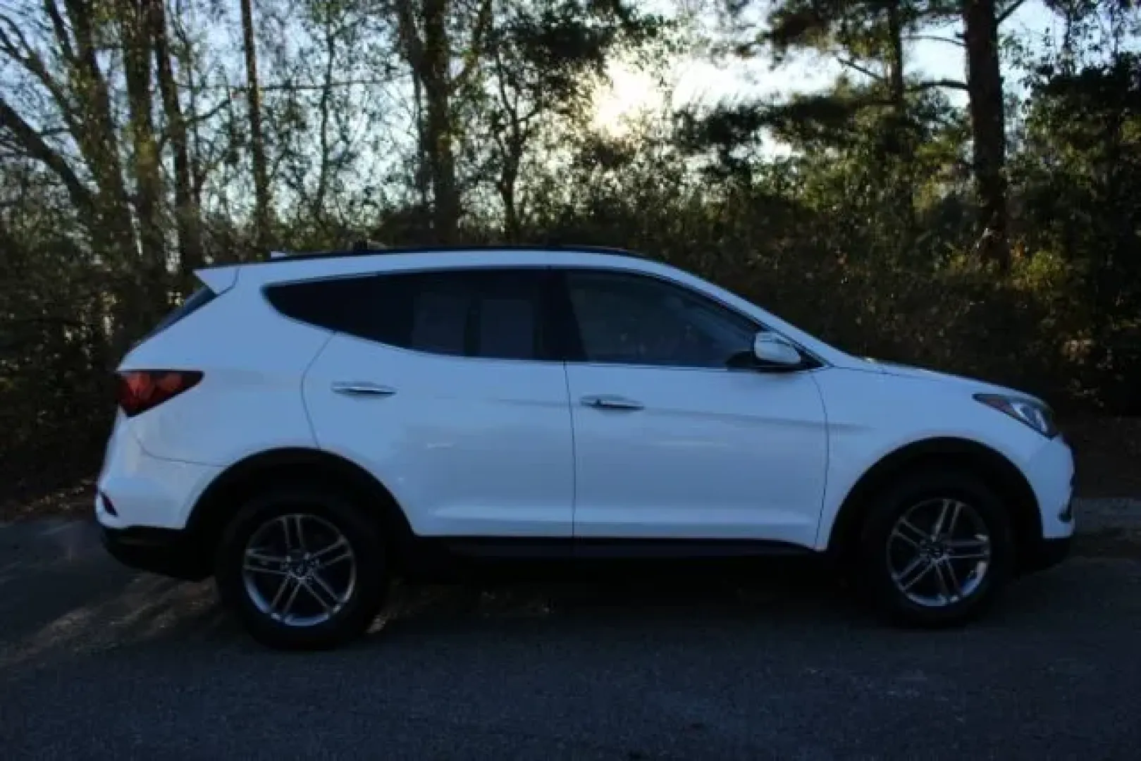 2018 Hyundai Santa Fe Sport 2.4 AWD (5NMZUDLB4JH) with an 2.4L L4 DOHC 16V engine, 6-Speed Automatic transmission, located at 3598 James B White Hwy South, Whiteville, NC, 28472, (910) 642-3196, 34.294846, -78.732613 - **Explore the Open Road with the 2018 Hyundai Santa Fe Sport Your Next Adventure Awaits!**<br /> <br /> Are you ready to elevate your weekend getaways or family outings? The 2018 Hyundai Santa Fe Sport is the perfect SUV that combines comfort, safety, and performance, making it an ideal choice for - Photo#3