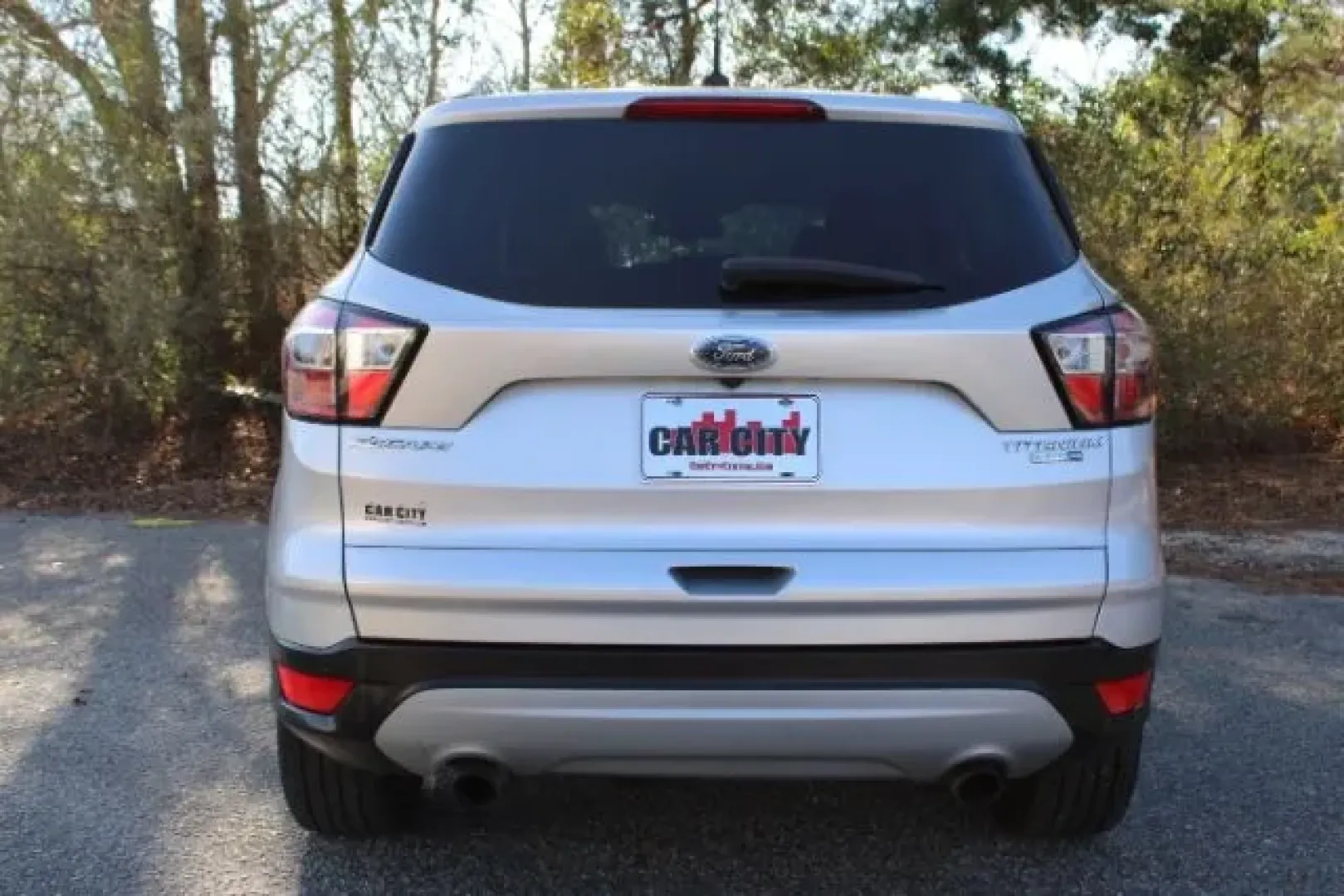 2017 /Charcoal Black Ford Escape Titanium (1FMCU9J91HU) with an Other engine, located at 3598 James B White Hwy South, Whiteville, NC, 28472, (910) 642-3196, 34.294846, -78.732613 - **Discover Adventure and Comfort with This 2017 Ford Escape Titanium at Car City - Whitesville!**<br /> <br /> Are you ready to elevate your travel experience with a perfect blend of style, comfort, and capability? Look no further than this stunning 2017 Ford Escape Titanium, now available at Car Ci - Photo#2