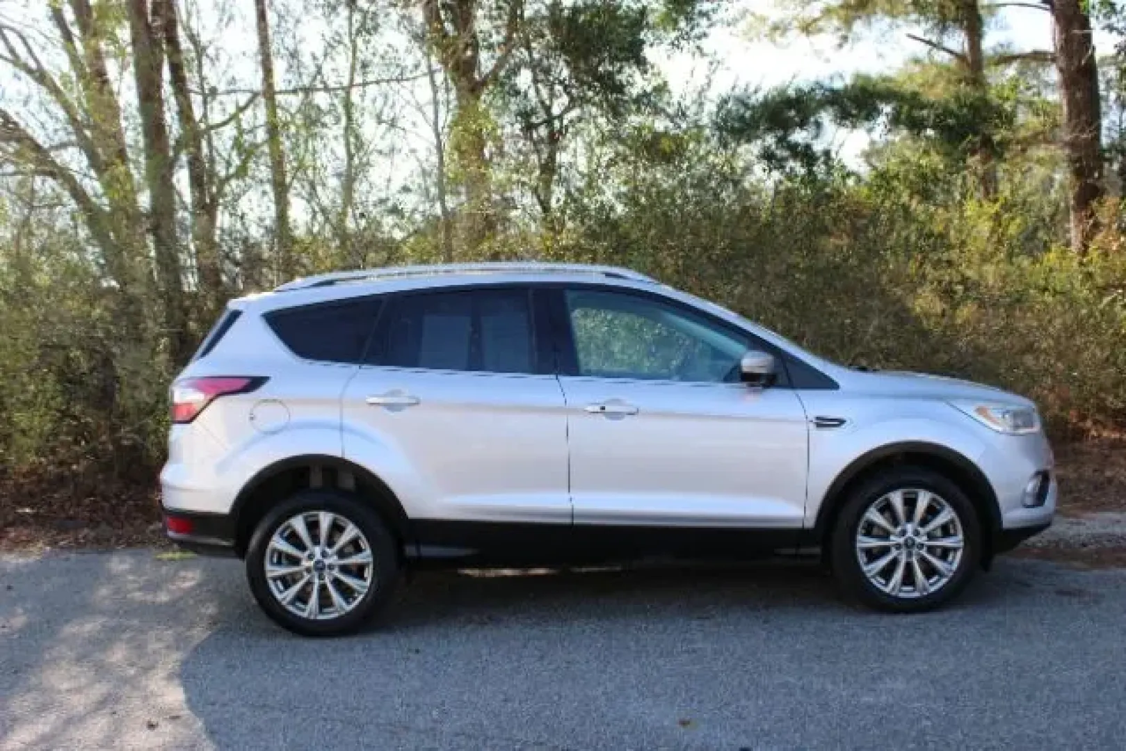 2017 /Charcoal Black Ford Escape Titanium (1FMCU9J91HU) with an Other engine, located at 3598 James B White Hwy South, Whiteville, NC, 28472, (910) 642-3196, 34.294846, -78.732613 - **Discover Adventure and Comfort with This 2017 Ford Escape Titanium at Car City - Whitesville!**<br /> <br /> Are you ready to elevate your travel experience with a perfect blend of style, comfort, and capability? Look no further than this stunning 2017 Ford Escape Titanium, now available at Car Ci - Photo#3