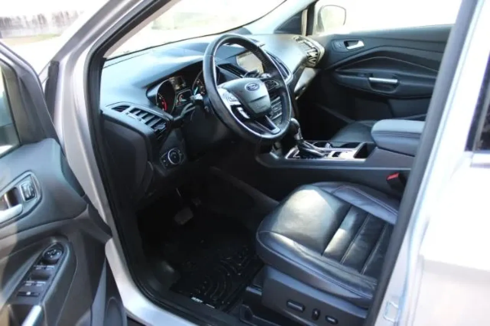 2017 /Charcoal Black Ford Escape Titanium (1FMCU9J91HU) with an Other engine, located at 3598 James B White Hwy South, Whiteville, NC, 28472, (910) 642-3196, 34.294846, -78.732613 - **Discover Adventure and Comfort with This 2017 Ford Escape Titanium at Car City - Whitesville!**<br /> <br /> Are you ready to elevate your travel experience with a perfect blend of style, comfort, and capability? Look no further than this stunning 2017 Ford Escape Titanium, now available at Car Ci - Photo#7