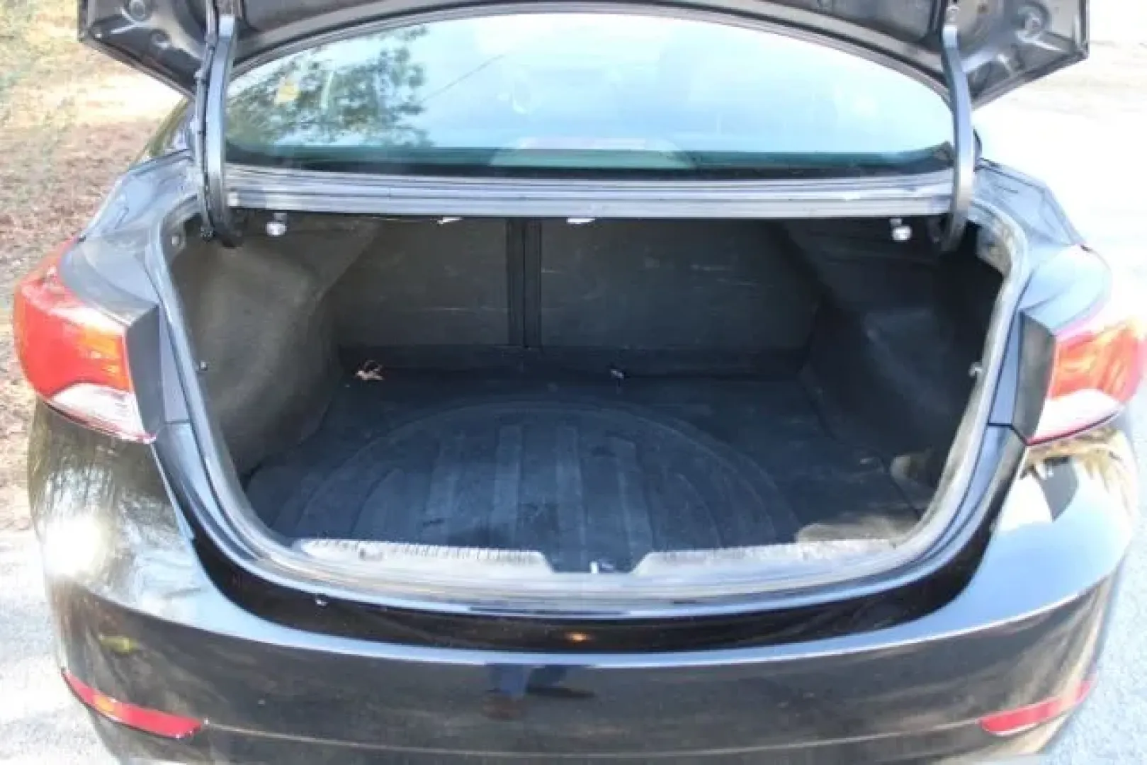 2016 /CHARCOAL CLOTH Hyundai Elantra Value Edition (KMHDH4AE7GU) with an Other engine, located at 3598 James B White Hwy South, Whiteville, NC, 28472, (910) 642-3196, 34.294846, -78.732613 - Are you ready to elevate your daily commute or weekend adventures without breaking the bank? Look no further than this 2016 Hyundai Elantra Value Edition, a perfect blend of style, comfort, and efficiency. With ample space for growing families and a fuel-efficient drivetrain, this sedan is an excell - Photo#11