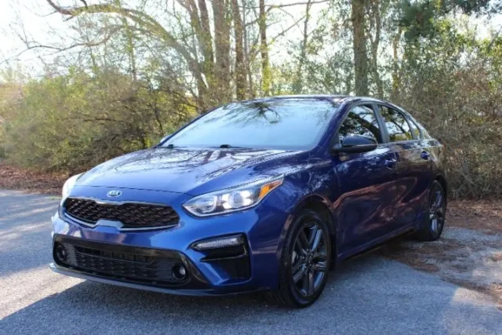 2021 /Black Kia Forte GT-Line (3KPF34AD4ME) with an 2L I-4 DOHC engine, located at 9146 Ocean Hwy West, Calabash, NC, 28467, (910) 579-1110, 33.928635, -78.576157 - **Drive Your Life Forward in the 2021 Kia Forte GT-Line at Car City - Whitesville!**<br /> <br /> If you're searching for a stylish, reliable sedan that effortlessly blends comfort, technology, and performance, look no further than the 2021 Kia Forte GT-Line. This pre-owned vehicle is perfect for th - Photo#0
