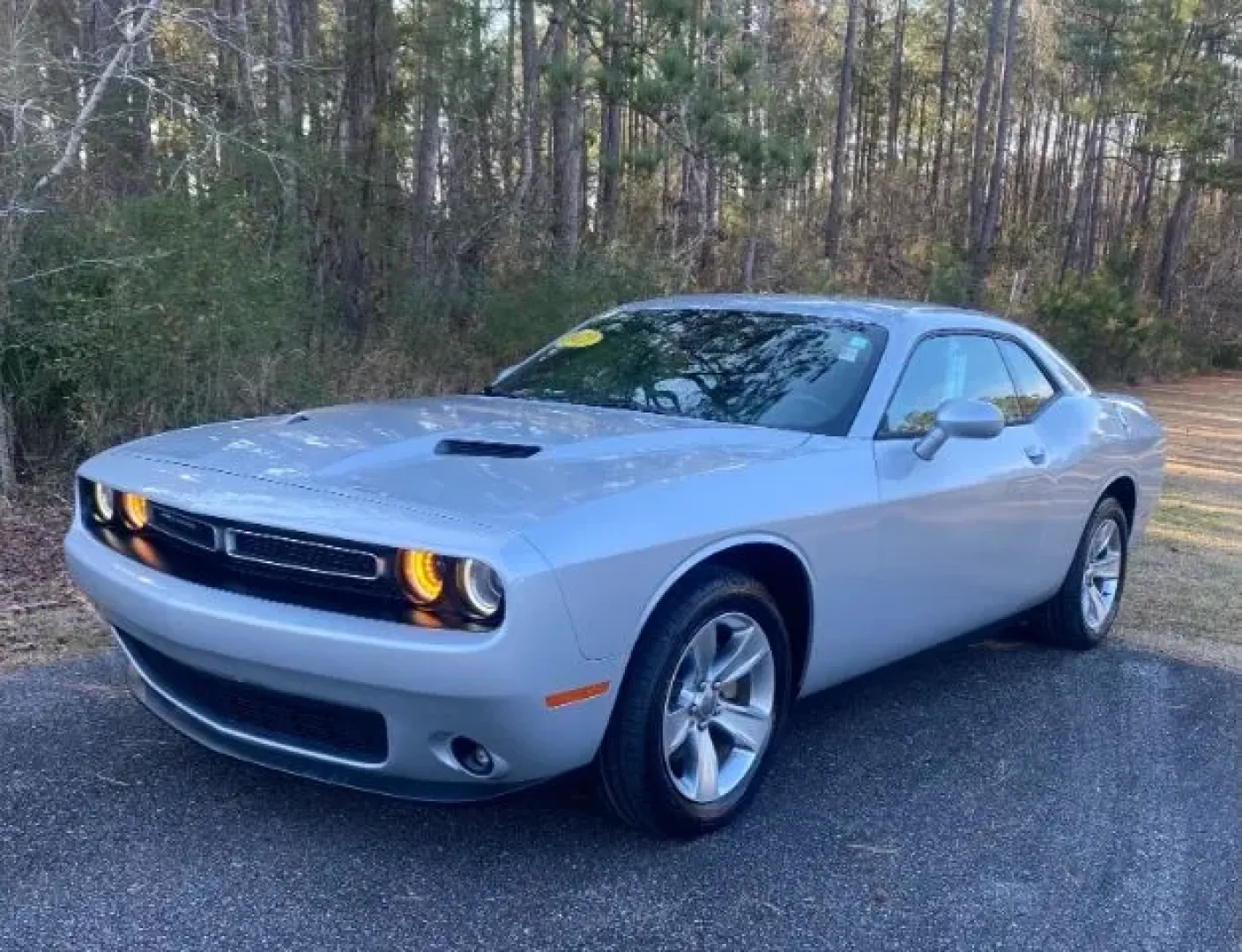 2021 Dodge Challenger SXT (2C3CDZAG4MH) with an 3.6L V6 DOHC 24V engine, 8-Speed Automatic transmission, located at 2761 East Hwy 501, Conway, SC, 29526, (843) 331-1151, 33.781528, -78.989883 - Unlock exhilarating weekend adventures with the stunning 2021 Dodge Challenger SXT-a perfect blend of performance, style, and practicality. At Car City - Calabash, we understand that life is about experiences, and this coupe is designed to elevate your journey, whether you're commuting to work, crui - Photo#0