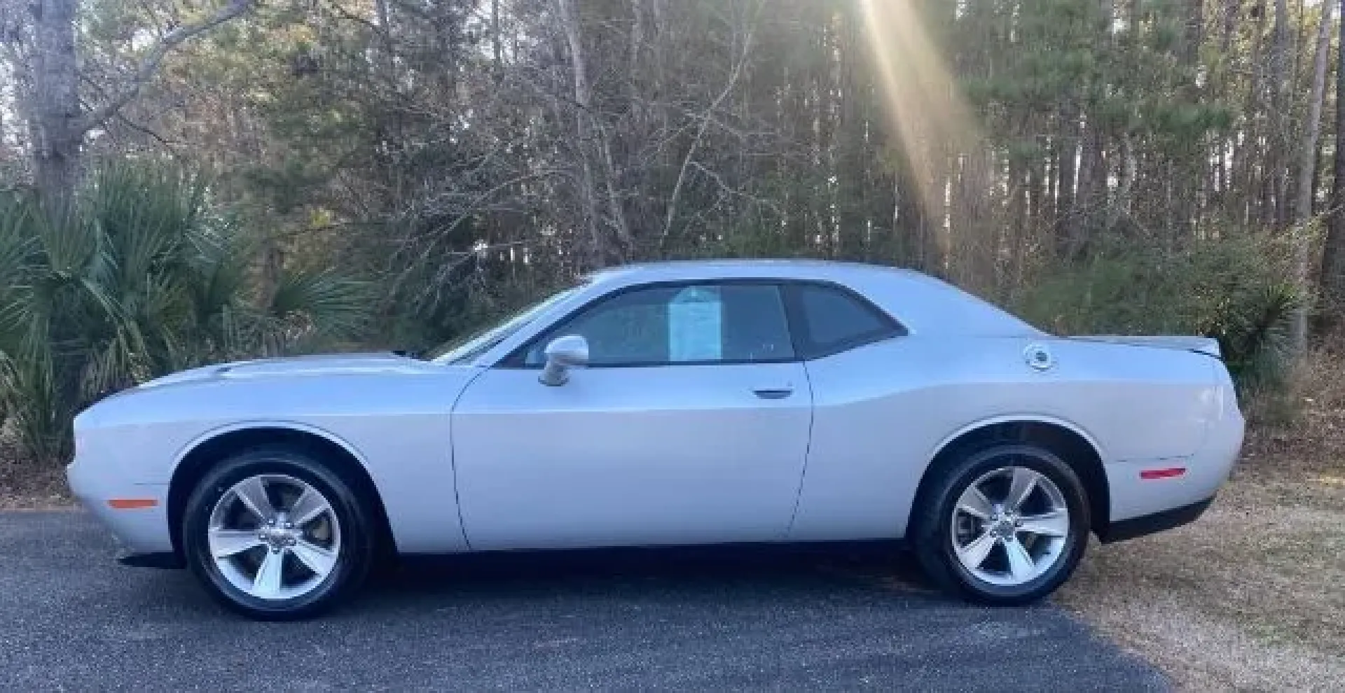 2021 Dodge Challenger SXT (2C3CDZAG4MH) with an 3.6L V6 DOHC 24V engine, 8-Speed Automatic transmission, located at 2761 East Hwy 501, Conway, SC, 29526, (843) 331-1151, 33.781528, -78.989883 - Unlock exhilarating weekend adventures with the stunning 2021 Dodge Challenger SXT-a perfect blend of performance, style, and practicality. At Car City - Calabash, we understand that life is about experiences, and this coupe is designed to elevate your journey, whether you're commuting to work, crui - Photo#2