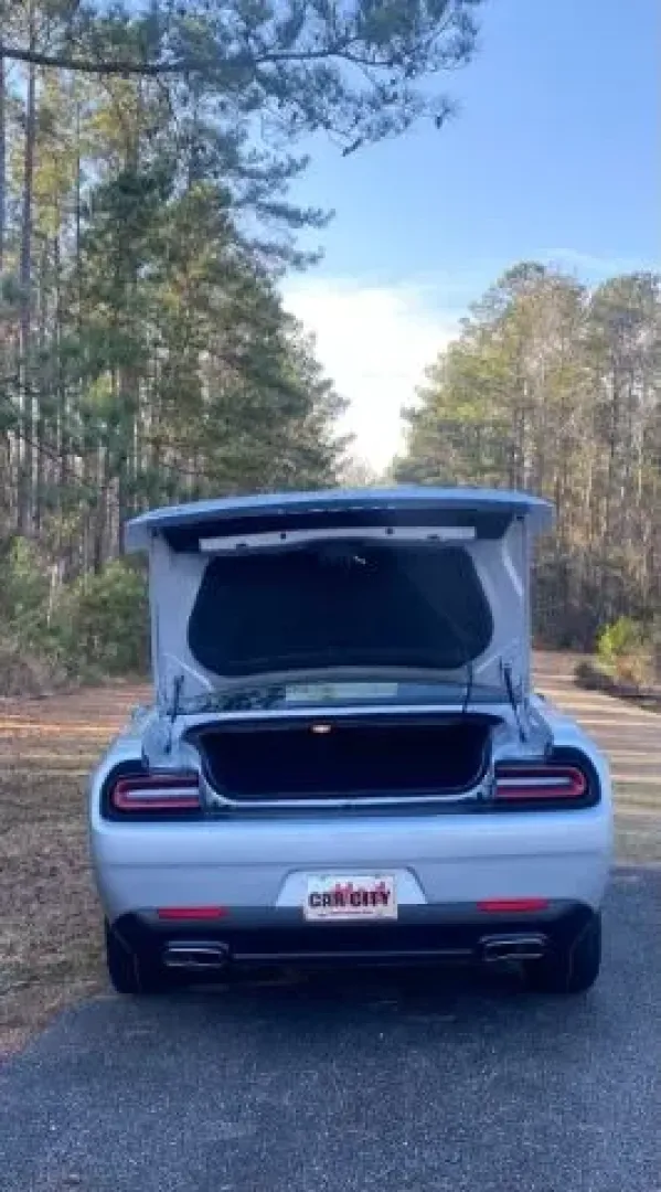 2021 Dodge Challenger SXT (2C3CDZAG4MH) with an 3.6L V6 DOHC 24V engine, 8-Speed Automatic transmission, located at 2761 East Hwy 501, Conway, SC, 29526, (843) 331-1151, 33.781528, -78.989883 - Unlock exhilarating weekend adventures with the stunning 2021 Dodge Challenger SXT-a perfect blend of performance, style, and practicality. At Car City - Calabash, we understand that life is about experiences, and this coupe is designed to elevate your journey, whether you're commuting to work, crui - Photo#8