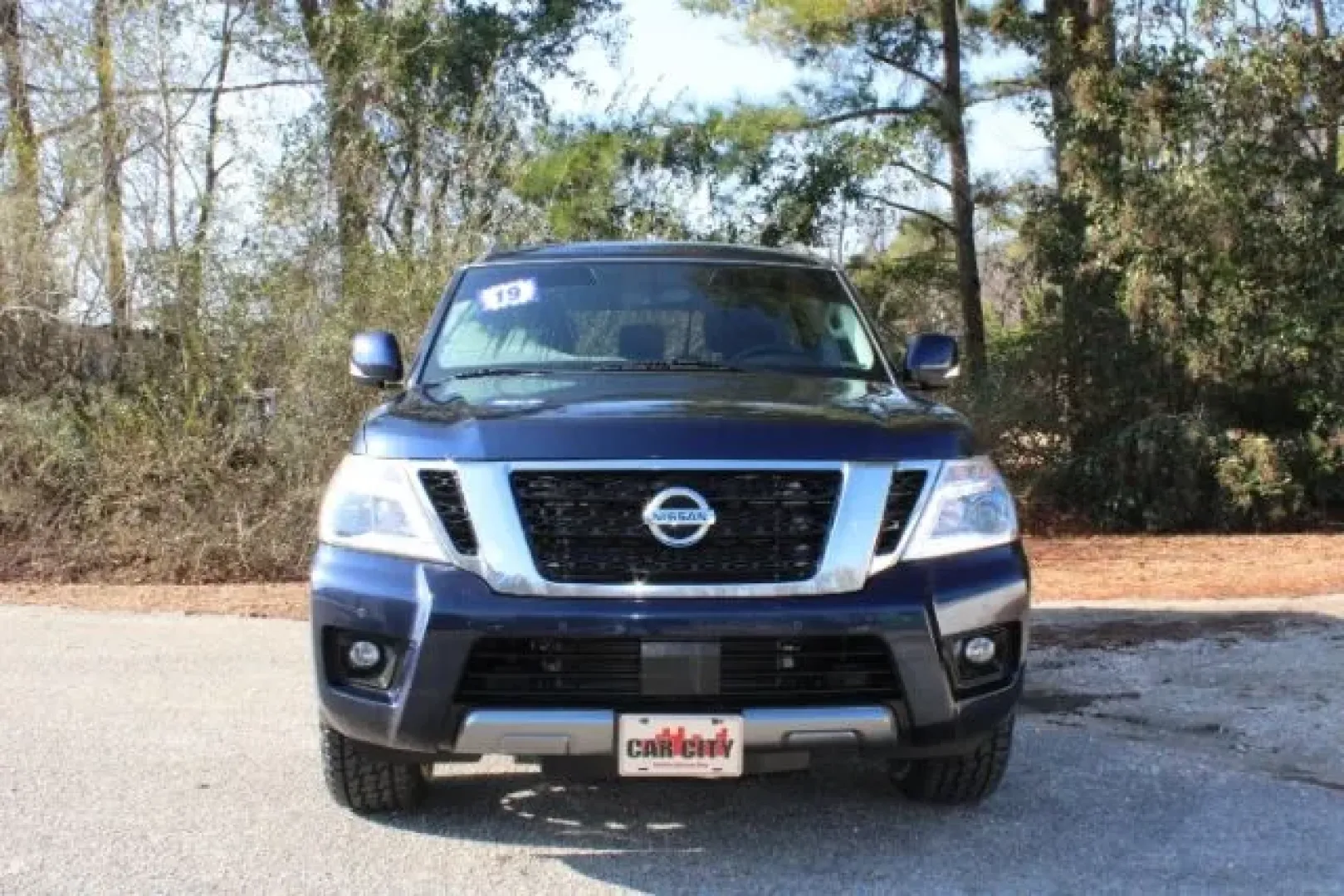 2019 Nissan Armada SV (JN8AY2NC4K9) with an Endurance 5.6L V-8 gasoline direct injection engine, located at 3598 James B White Hwy South, Whiteville, NC, 28472, (910) 642-3196, 34.294846, -78.732613 - Dreaming of weekend beach runs to Wrightsville, family road trips with everyone comfortable, or a confident 4WD SUV for unpredictable Carolina weather? This 2019 Nissan Armada SV in striking Hermosa Blue Pearl delivers big-space versatility, strong V8 power, and three-row practicality-an ideal match - Photo#1