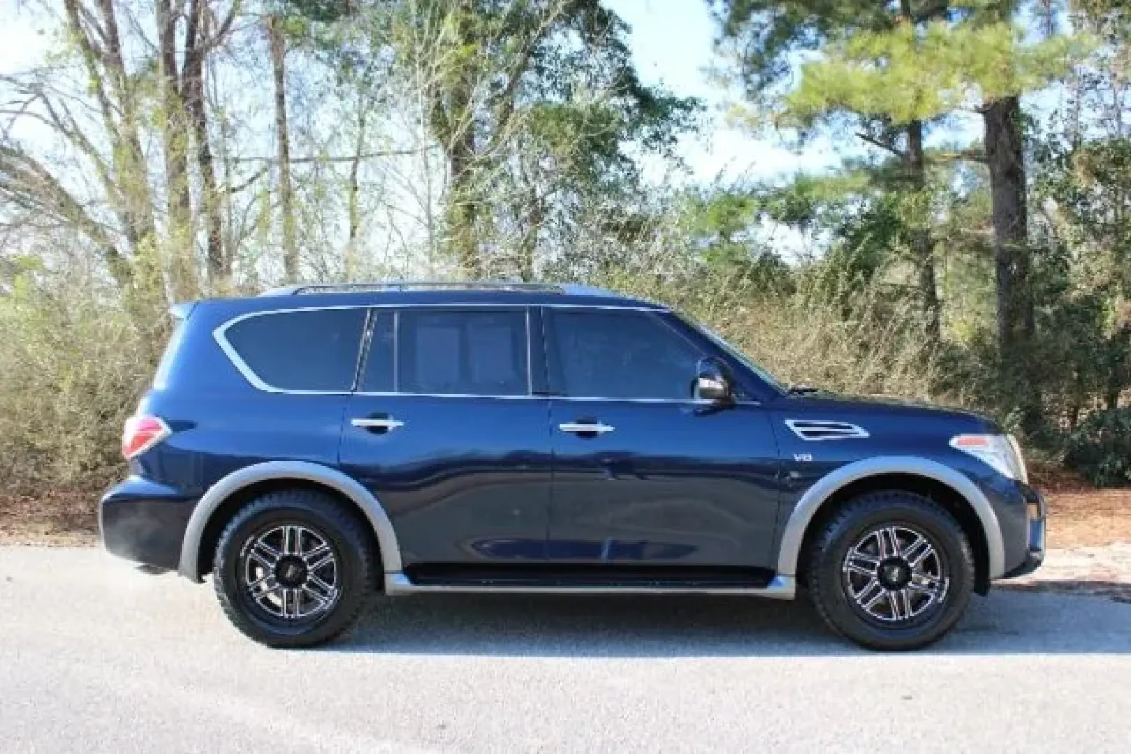 2019 Nissan Armada SV (JN8AY2NC4K9) with an Endurance 5.6L V-8 gasoline direct injection engine, located at 3598 James B White Hwy South, Whiteville, NC, 28472, (910) 642-3196, 34.294846, -78.732613 - Dreaming of weekend beach runs to Wrightsville, family road trips with everyone comfortable, or a confident 4WD SUV for unpredictable Carolina weather? This 2019 Nissan Armada SV in striking Hermosa Blue Pearl delivers big-space versatility, strong V8 power, and three-row practicality-an ideal match - Photo#3