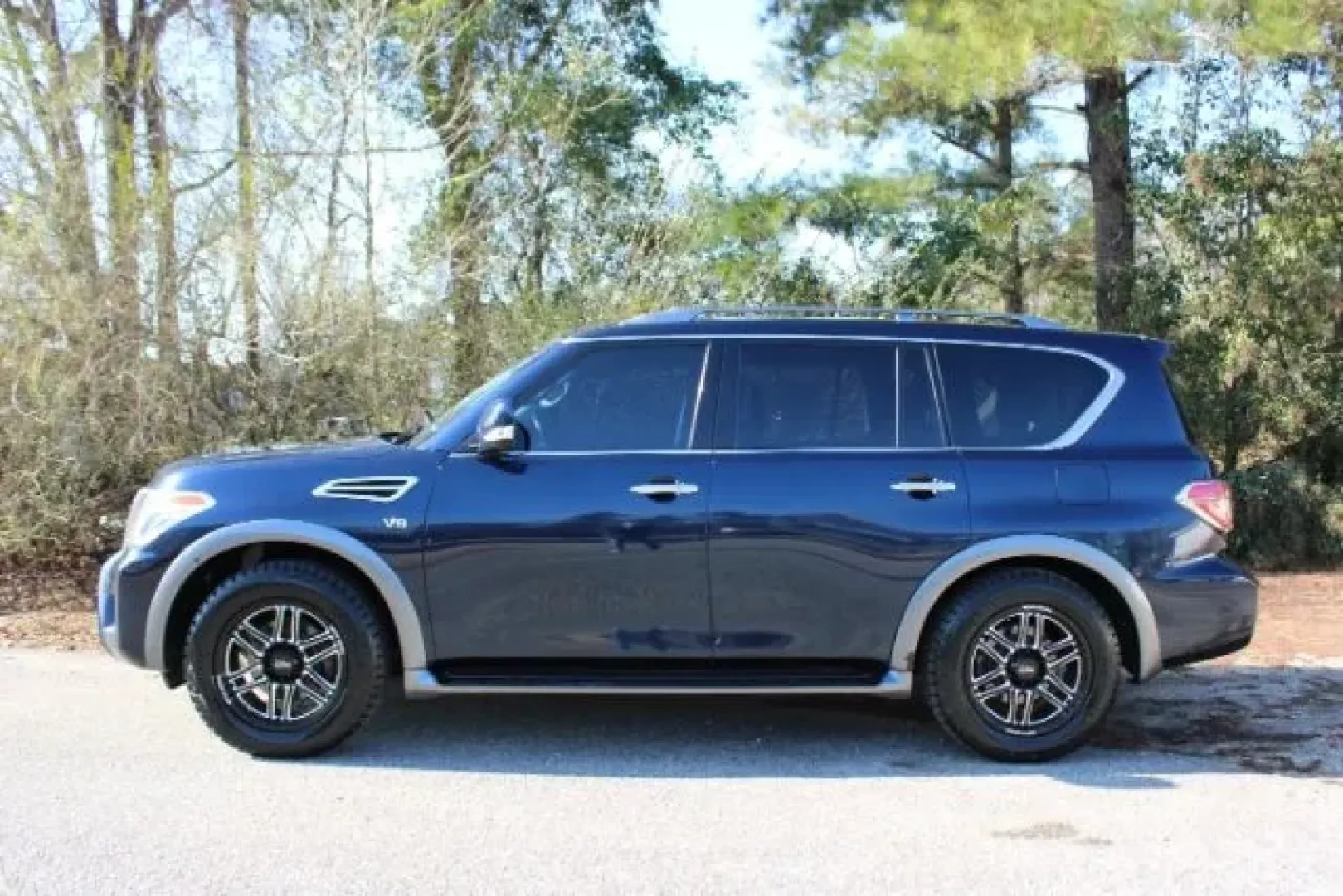 2019 Nissan Armada SV (JN8AY2NC4K9) with an Endurance 5.6L V-8 gasoline direct injection engine, located at 3598 James B White Hwy South, Whiteville, NC, 28472, (910) 642-3196, 34.294846, -78.732613 - Dreaming of weekend beach runs to Wrightsville, family road trips with everyone comfortable, or a confident 4WD SUV for unpredictable Carolina weather? This 2019 Nissan Armada SV in striking Hermosa Blue Pearl delivers big-space versatility, strong V8 power, and three-row practicality-an ideal match - Photo#4