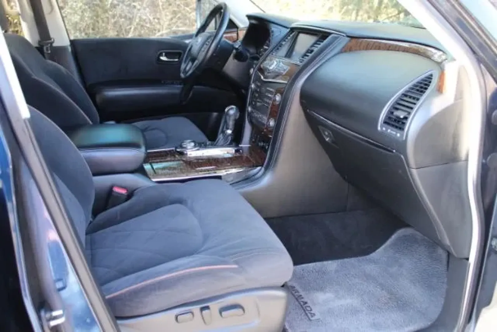 2019 Nissan Armada SV (JN8AY2NC4K9) with an Endurance 5.6L V-8 gasoline direct injection engine, located at 3598 James B White Hwy South, Whiteville, NC, 28472, (910) 642-3196, 34.294846, -78.732613 - Dreaming of weekend beach runs to Wrightsville, family road trips with everyone comfortable, or a confident 4WD SUV for unpredictable Carolina weather? This 2019 Nissan Armada SV in striking Hermosa Blue Pearl delivers big-space versatility, strong V8 power, and three-row practicality-an ideal match - Photo#9