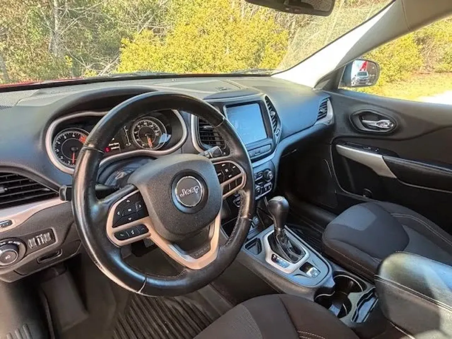 2017 /Black, premium cloth Jeep Cherokee Latitude FWD (1C4PJLCS3HW) with an 3.2L V6 DOHC 24V engine, 9-Speed Automatic transmission, located at 9146 Ocean Hwy West, Calabash, NC, 28467, (910) 579-1110, 33.928635, -78.576157 - Weekend beach runs to Sunset Beach, a smooth daily commute up Ocean Hwy (US-17), or a spontaneous road trip down to Myrtle Beach-this 2017 Jeep Cherokee Latitude FWD is built for the coastal Carolina lifestyle. With its Deep Cherry Red Crystal Pearl Coat exterior and comfortable black premium cloth - Photo#9