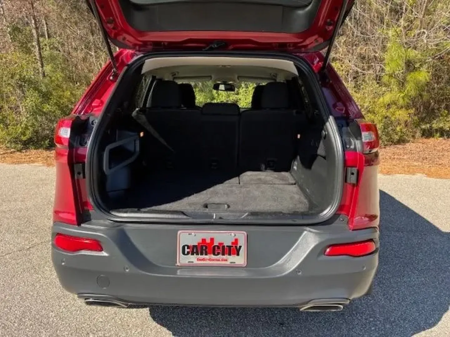 2017 /Black, premium cloth Jeep Cherokee Latitude FWD (1C4PJLCS3HW) with an 3.2L V6 DOHC 24V engine, 9-Speed Automatic transmission, located at 9146 Ocean Hwy West, Calabash, NC, 28467, (910) 579-1110, 33.928635, -78.576157 - Weekend beach runs to Sunset Beach, a smooth daily commute up Ocean Hwy (US-17), or a spontaneous road trip down to Myrtle Beach-this 2017 Jeep Cherokee Latitude FWD is built for the coastal Carolina lifestyle. With its Deep Cherry Red Crystal Pearl Coat exterior and comfortable black premium cloth - Photo#12