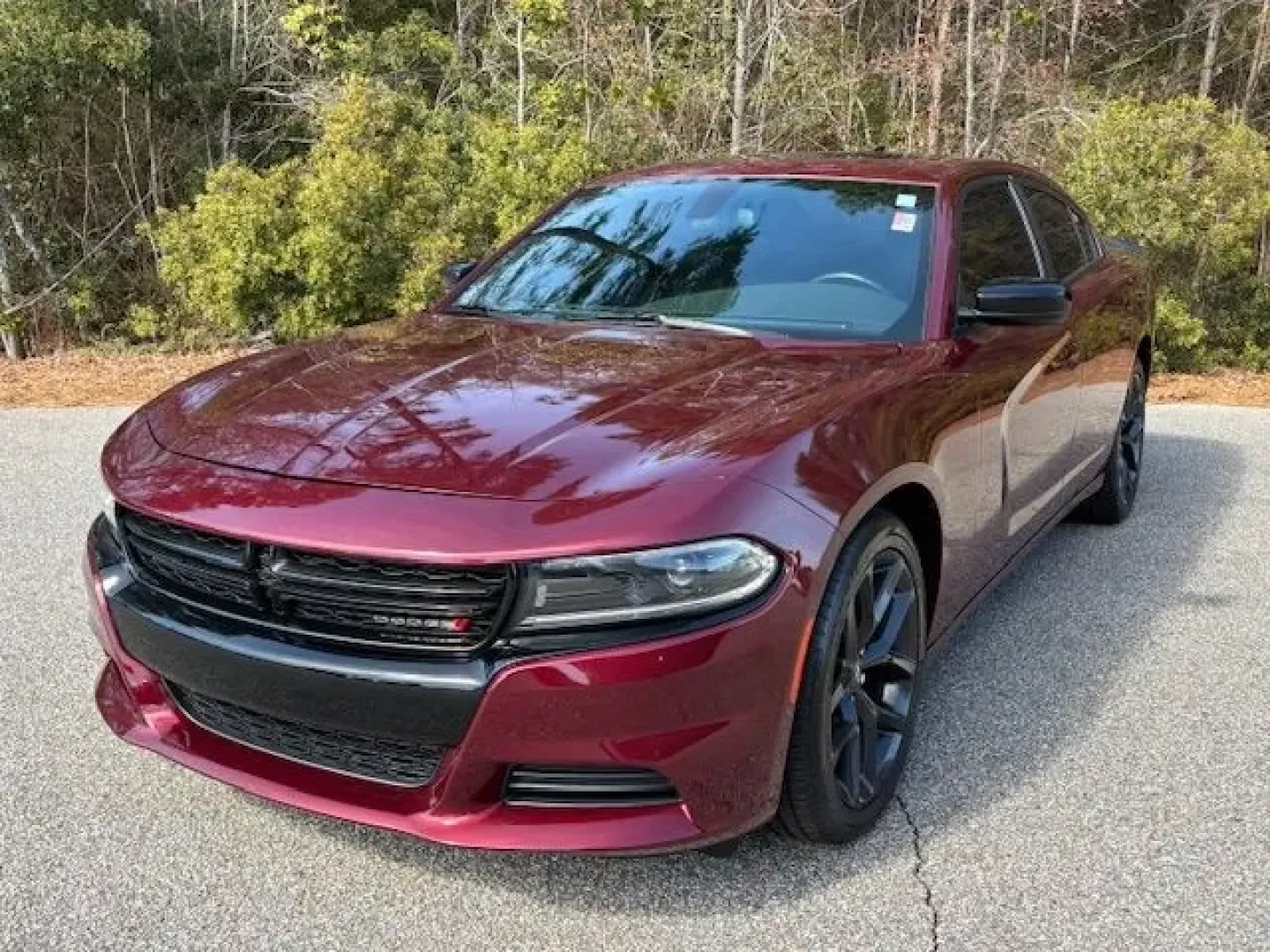 2023 /Black Dodge Charger SXT (2C3CDXBG1PH) with an Pentastar 3.6L V-6 DOHC engine, 8A transmission, located at 2761 East Hwy 501, Conway, SC, 29526, (843) 331-1151, 33.781528, -78.989883 - Weekend escape to Myrtle Beach, a confident daily commute down Highway 501, or a sleek ride for date night in Downtown Conway-this 2023 Dodge Charger SXT is built for drivers who want muscle-car attitude with real-world comfort. Finished in head-turning Octane Red Pearlcoat with a refined Black inte - Photo#0