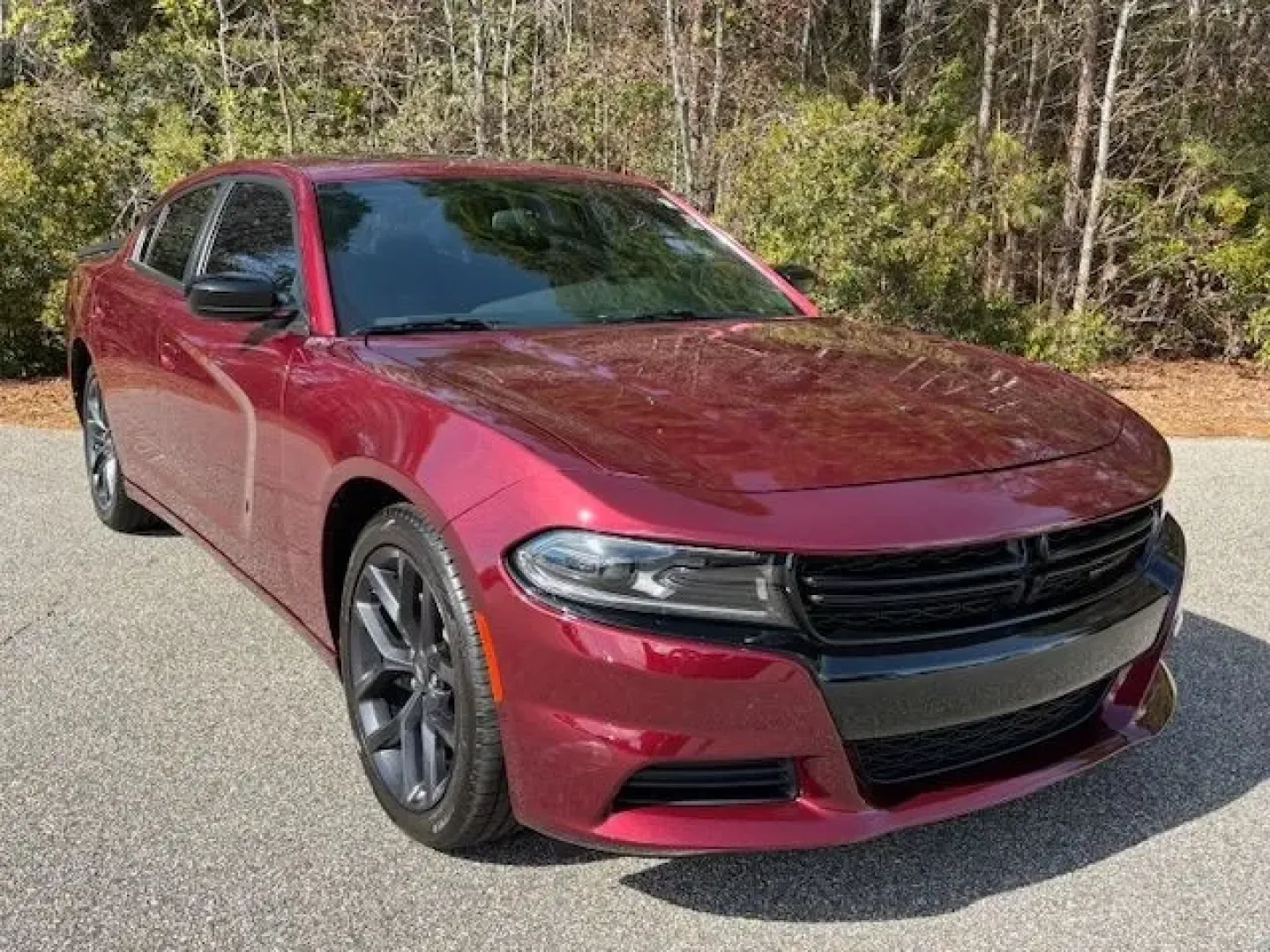 2023 /Black Dodge Charger SXT (2C3CDXBG1PH) with an Pentastar 3.6L V-6 DOHC engine, 8A transmission, located at 2761 East Hwy 501, Conway, SC, 29526, (843) 331-1151, 33.781528, -78.989883 - Weekend escape to Myrtle Beach, a confident daily commute down Highway 501, or a sleek ride for date night in Downtown Conway-this 2023 Dodge Charger SXT is built for drivers who want muscle-car attitude with real-world comfort. Finished in head-turning Octane Red Pearlcoat with a refined Black inte - Photo#1