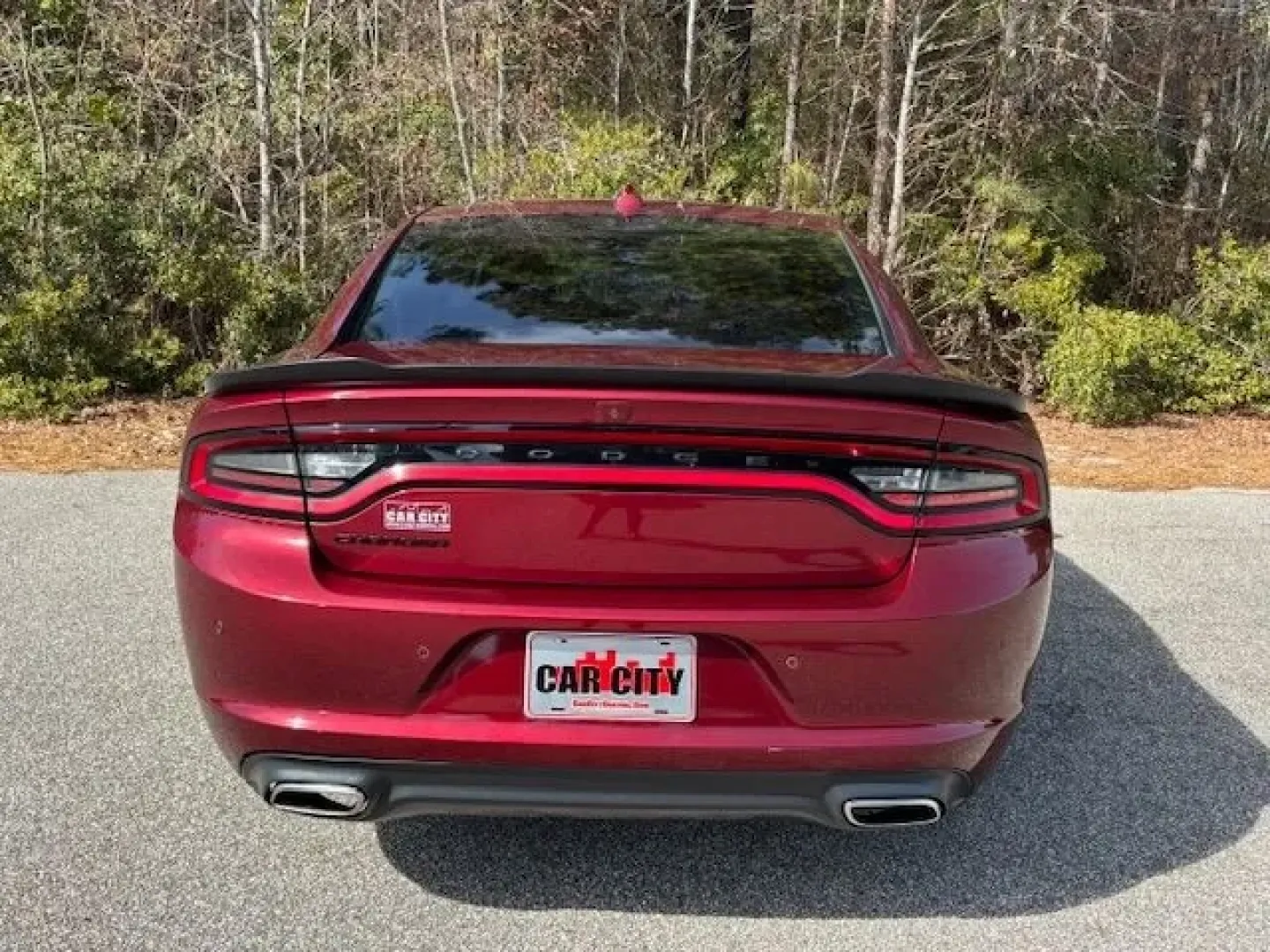 2023 /Black Dodge Charger SXT (2C3CDXBG1PH) with an Pentastar 3.6L V-6 DOHC engine, 8A transmission, located at 2761 East Hwy 501, Conway, SC, 29526, (843) 331-1151, 33.781528, -78.989883 - Weekend escape to Myrtle Beach, a confident daily commute down Highway 501, or a sleek ride for date night in Downtown Conway-this 2023 Dodge Charger SXT is built for drivers who want muscle-car attitude with real-world comfort. Finished in head-turning Octane Red Pearlcoat with a refined Black inte - Photo#5