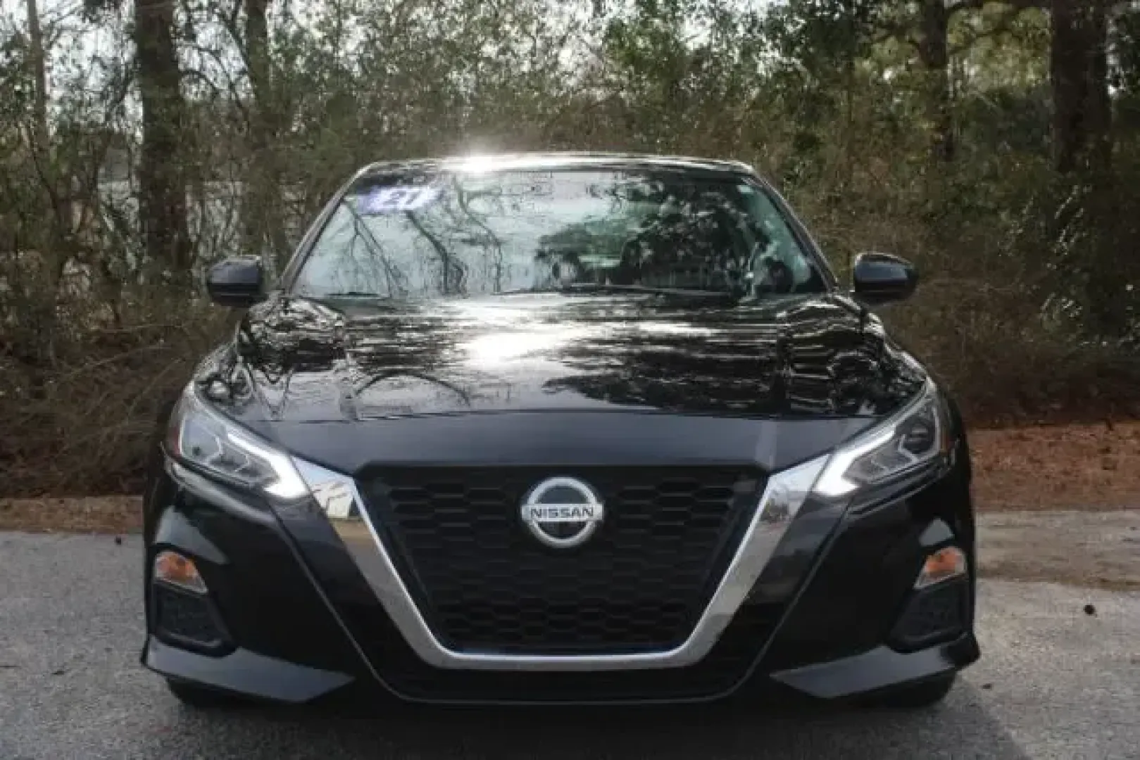 2021 /Charcoal, cloth Nissan Altima 2.5 SV (1N4BL4DV7MN) with an 2.5L L4 DOHC 16V engine, Continuously Variabl transmission, located at 3598 James B White Hwy South, Whiteville, NC, 28472, (910) 642-3196, 34.294846, -78.732613 - Life moves fast in Columbus County-between daily commutes down US-701, school drop-offs, and weekend runs toward Lake Waccamaw-so you need a sedan that's comfortable, efficient, and easy to live with. This **2021 Nissan Altima 2.5 SV** in **Super Black** is built for real-life driving in and around - Photo#1
