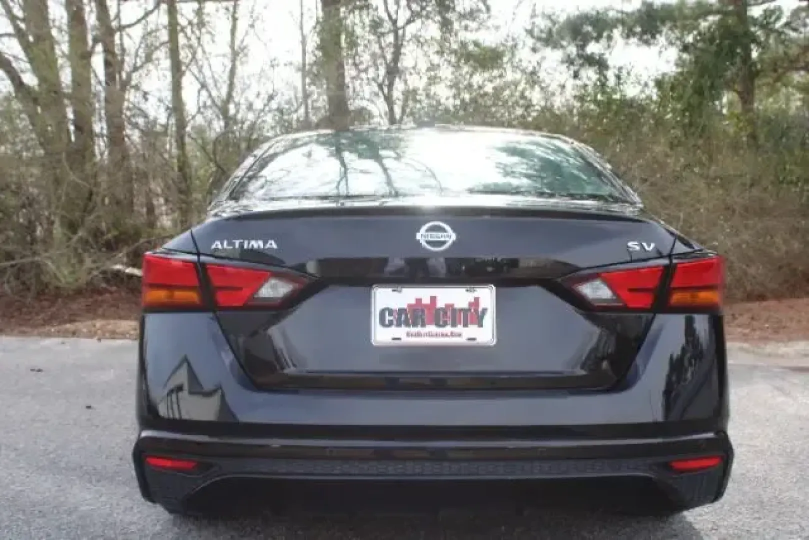 2021 /Charcoal, cloth Nissan Altima 2.5 SV (1N4BL4DV7MN) with an 2.5L L4 DOHC 16V engine, Continuously Variabl transmission, located at 3598 James B White Hwy South, Whiteville, NC, 28472, (910) 642-3196, 34.294846, -78.732613 - Life moves fast in Columbus County-between daily commutes down US-701, school drop-offs, and weekend runs toward Lake Waccamaw-so you need a sedan that's comfortable, efficient, and easy to live with. This **2021 Nissan Altima 2.5 SV** in **Super Black** is built for real-life driving in and around - Photo#2