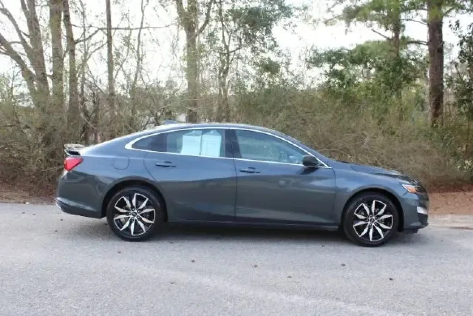 2021 /Jet Black Chevrolet Malibu FWD RS (1G1ZG5ST5MF) with an ECOTEC 1.5L I-4 gasoline direct injection engine, 6A transmission, located at 3598 James B White Hwy South, Whiteville, NC, 28472, (910) 642-3196, 34.294846, -78.732613 - Need a stylish, comfortable commuter that can also handle weekend getaways to the coast? This 2021 Chevrolet Malibu RS is built for real life in Whiteville-easy to drive, efficient on regular unleaded, and roomy enough for everything from school drop-offs to road trips down US-74 toward Wilmington o - Photo#3
