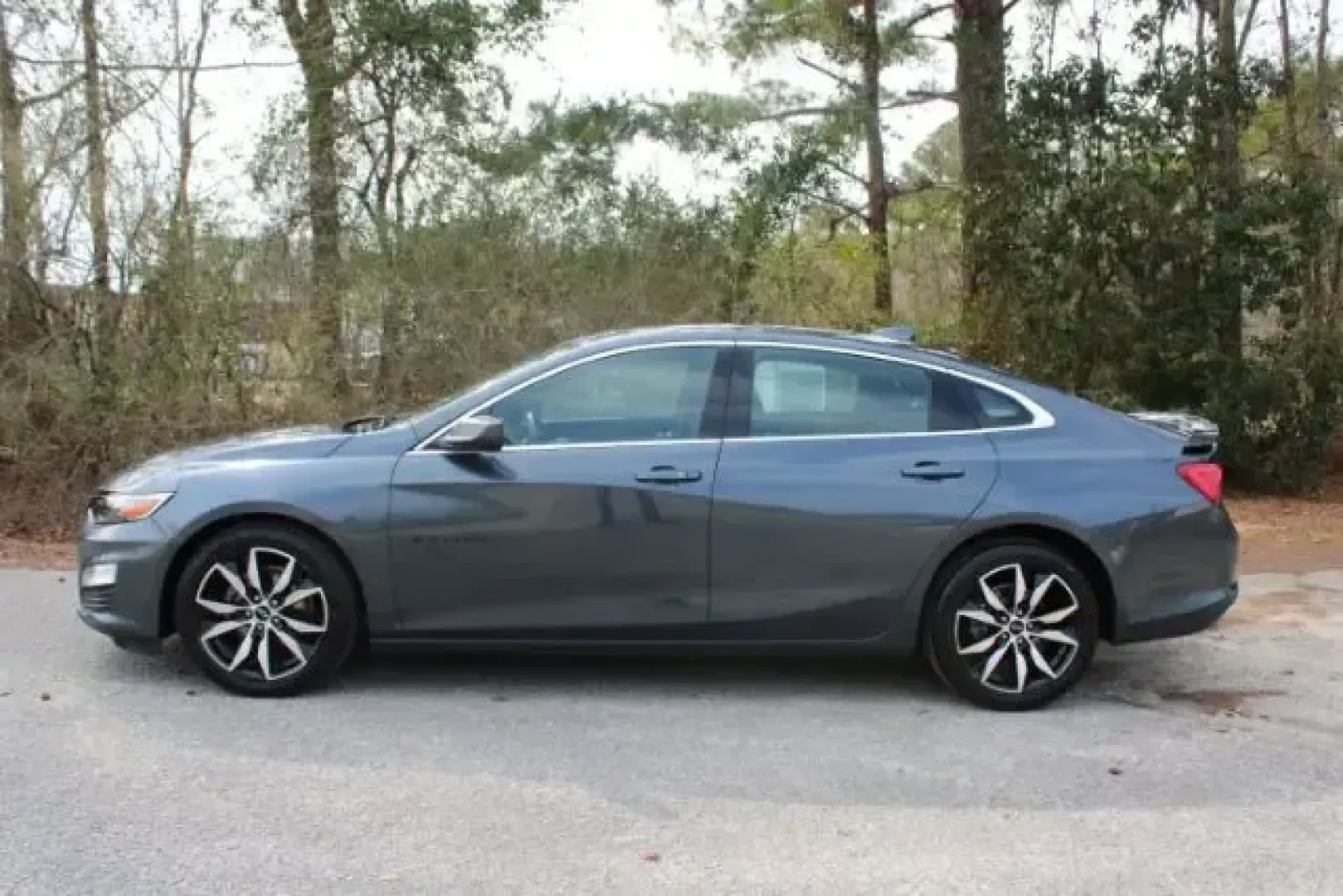 2021 /Jet Black Chevrolet Malibu FWD RS (1G1ZG5ST5MF) with an ECOTEC 1.5L I-4 gasoline direct injection engine, 6A transmission, located at 3598 James B White Hwy South, Whiteville, NC, 28472, (910) 642-3196, 34.294846, -78.732613 - Need a stylish, comfortable commuter that can also handle weekend getaways to the coast? This 2021 Chevrolet Malibu RS is built for real life in Whiteville-easy to drive, efficient on regular unleaded, and roomy enough for everything from school drop-offs to road trips down US-74 toward Wilmington o - Photo#4