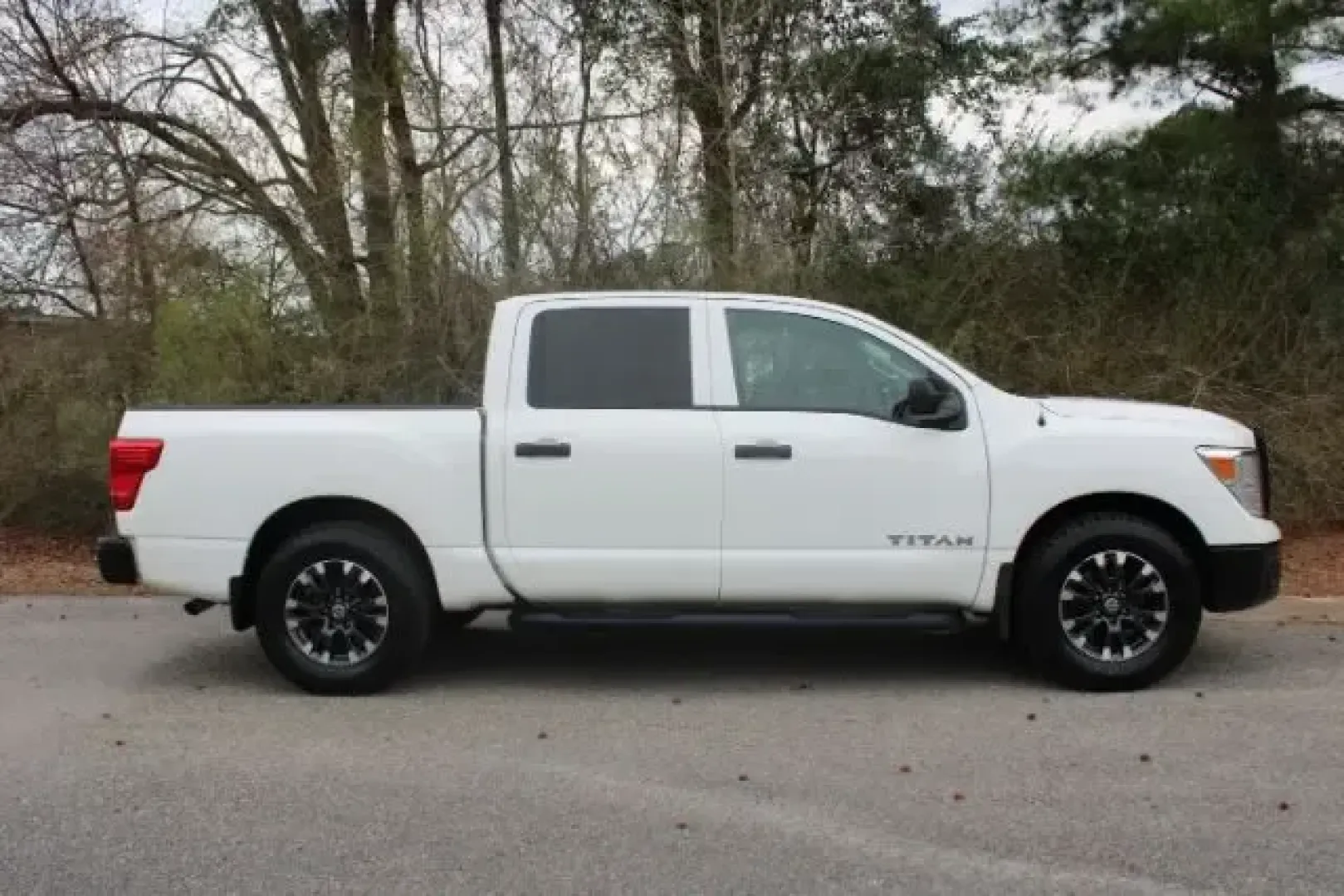 2019 Nissan TITAN S (1N6AA1EK7KN) with an Endurance 5.6L V-8 gasoline direct injection engine, 6A transmission, located at 3598 James B White Hwy South, Whiteville, NC, 28472, (910) 642-3196, 34.294846, -78.732613 - Weekend projects, coastal getaways, and everyday hauling feel a whole lot easier when you've got a full-size truck that's ready for real life. If you're a homeowner tackling Saturday runs to the lumber yard, a commuter who wants a confident ride on Hwy 701, or a family that needs space for road trip - Photo#3