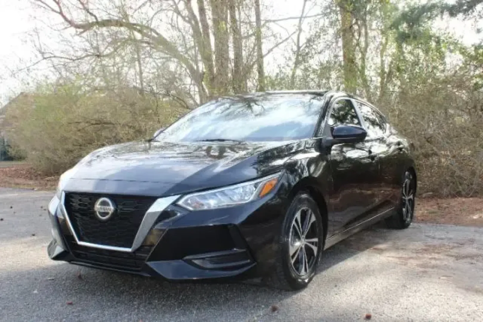 2021 /Charcoal Nissan Sentra SV (3N1AB8CV8MY) with an 1.8L L4 SFI DOHC 16V engine, Continuously Variable Transmission transmission, located at 3598 James B White Hwy South, Whiteville, NC, 28472, (910) 642-3196, 34.294846, -78.732613 - Make your daily drive feel easier-whether you're commuting down US-74, running errands between Whiteville and Lake Waccamaw, or planning a weekend trip toward Wilmington-this 2021 Nissan Sentra SV is the kind of smart, comfortable sedan that fits real life. With its sleek Super Black exterior, Charc - Photo#0