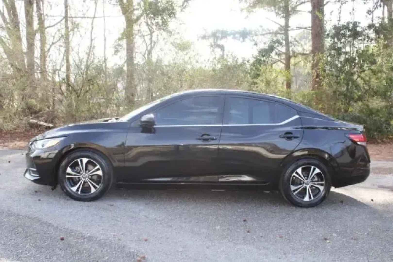 2021 /Charcoal Nissan Sentra SV (3N1AB8CV8MY) with an 1.8L L4 SFI DOHC 16V engine, Continuously Variable Transmission transmission, located at 3598 James B White Hwy South, Whiteville, NC, 28472, (910) 642-3196, 34.294846, -78.732613 - Make your daily drive feel easier-whether you're commuting down US-74, running errands between Whiteville and Lake Waccamaw, or planning a weekend trip toward Wilmington-this 2021 Nissan Sentra SV is the kind of smart, comfortable sedan that fits real life. With its sleek Super Black exterior, Charc - Photo#4