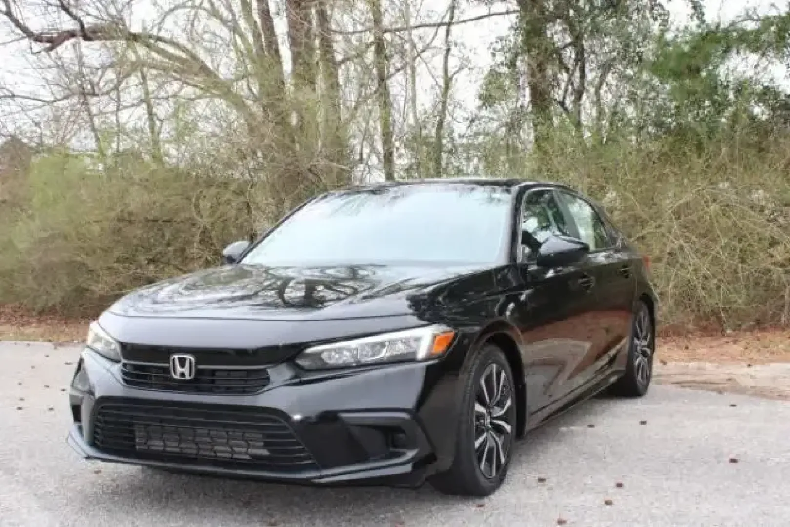2022 Honda Civic Sedan EX (JHMFE1F72NX) with an 1.5L I-4 gasoline direct injection engine, CVT transmission, located at 3598 James B White Hwy South, Whiteville, NC, 28472, (910) 642-3196, 34.294846, -78.732613 - For commuters who rack up miles on Highway 701, students heading between Whiteville and Wilmington, or couples planning weekend runs to Lake Waccamaw State Park, this 2022 Honda Civic Sedan EX is the kind of smart, efficient sedan that fits real life. With its sleek Crystal Black Pearl finish and pr - Photo#0