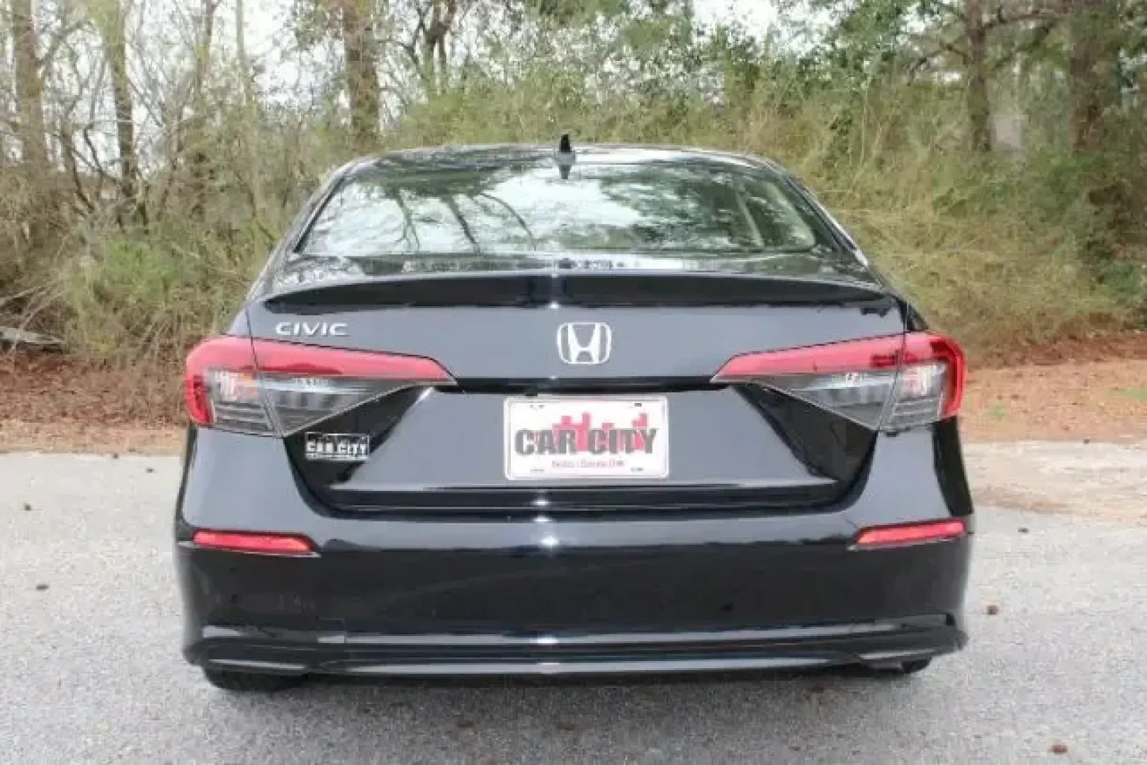 2022 Honda Civic Sedan EX (JHMFE1F72NX) with an 1.5L I-4 gasoline direct injection engine, CVT transmission, located at 3598 James B White Hwy South, Whiteville, NC, 28472, (910) 642-3196, 34.294846, -78.732613 - For commuters who rack up miles on Highway 701, students heading between Whiteville and Wilmington, or couples planning weekend runs to Lake Waccamaw State Park, this 2022 Honda Civic Sedan EX is the kind of smart, efficient sedan that fits real life. With its sleek Crystal Black Pearl finish and pr - Photo#2