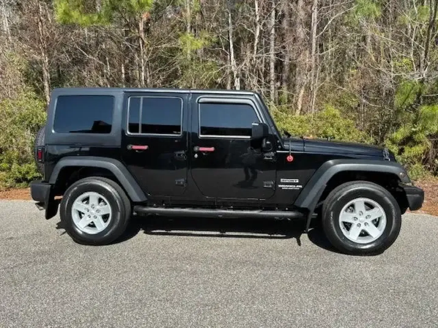 2016 /Black Jeep Wrangler Sport (1C4BJWDG4GL) with an Pentastar 3.6L V-6 DOHC engine, located at 2761 East Hwy 501, Conway, SC, 29526, (843) 331-1151, 33.781528, -78.989883 - Whether your weekends are for beach runs to Myrtle Beach, backroad exploring toward Aynor, or simply cruising your daily route along Highway 501, this **2016 Jeep Wrangler Sport** is the kind of SUV that turns ordinary drives into mini-adventures. With its iconic stance, trail-ready hardware, and ev - Photo#3