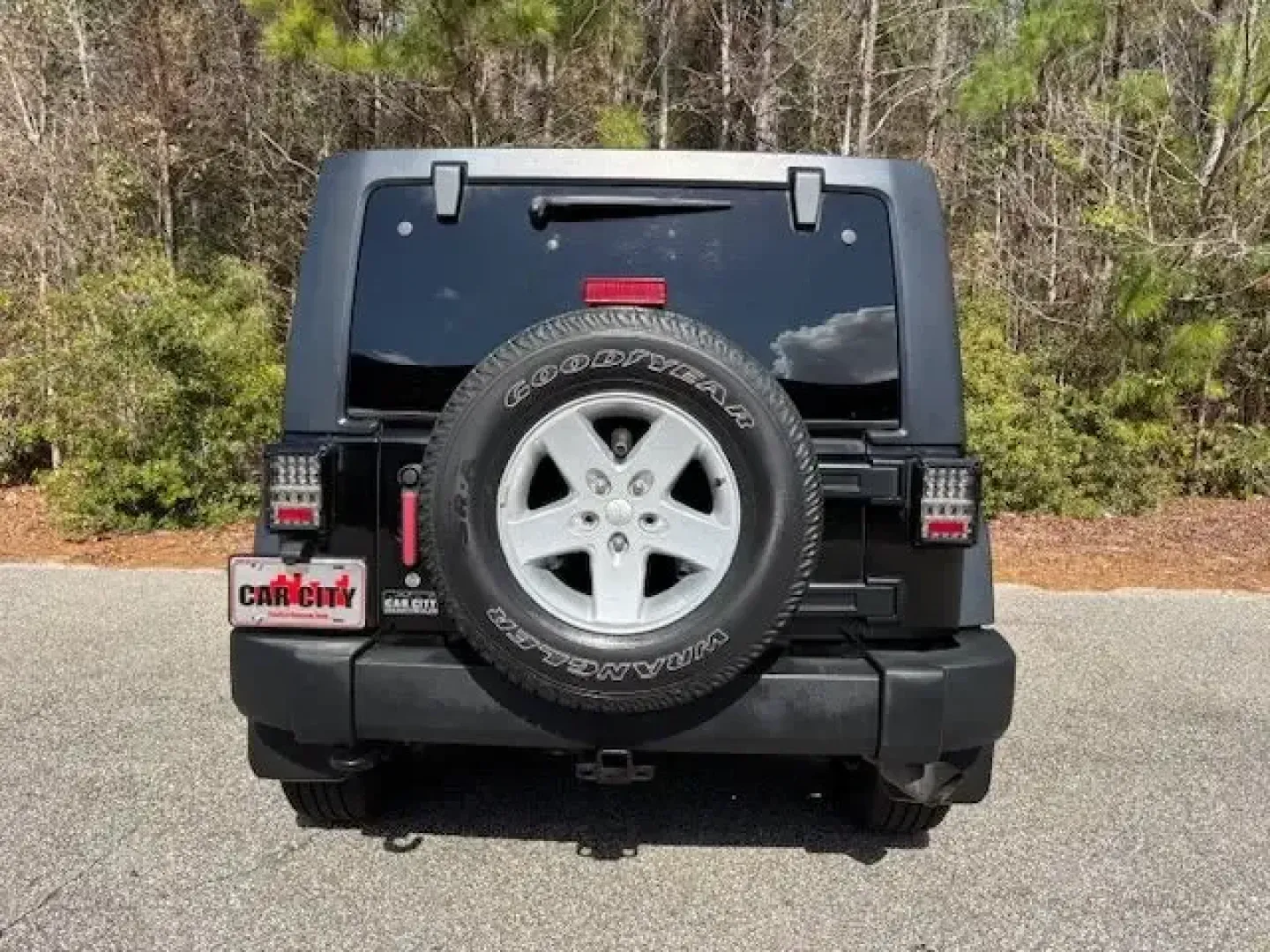 2016 /Black Jeep Wrangler Sport (1C4BJWDG4GL) with an Pentastar 3.6L V-6 DOHC engine, located at 2761 East Hwy 501, Conway, SC, 29526, (843) 331-1151, 33.781528, -78.989883 - Whether your weekends are for beach runs to Myrtle Beach, backroad exploring toward Aynor, or simply cruising your daily route along Highway 501, this **2016 Jeep Wrangler Sport** is the kind of SUV that turns ordinary drives into mini-adventures. With its iconic stance, trail-ready hardware, and ev - Photo#5